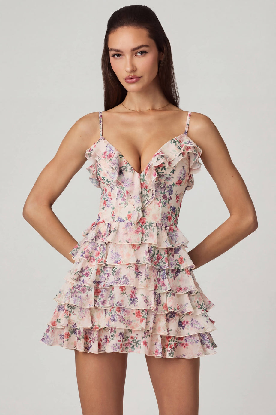 Oh Polly's Anna wearing the Lolina Mini Dress in Primose Floral Print Mesh fabric perfect for wedding guest style