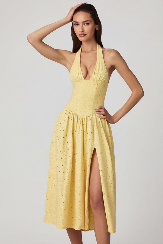 Oh Polly's Anna wearing the Farrah Maxi Dress in Lemon Yellow Cotton Jersey fabric perfect for daytime weddings