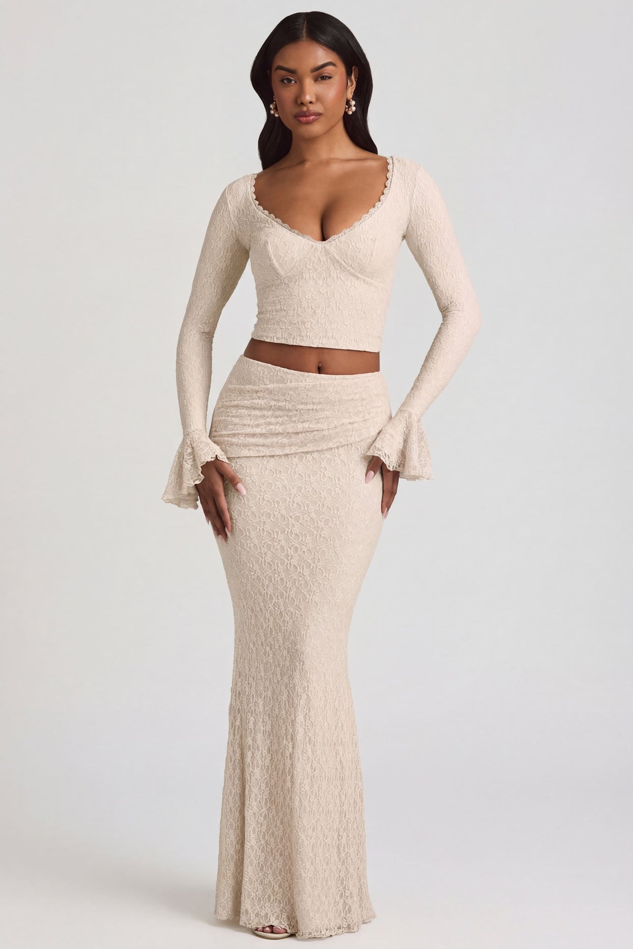 Oh Polly's Freya Tidy wearing the Dagny Full Top in Ivory Stretch Lace fabric perfect for summer garden parties