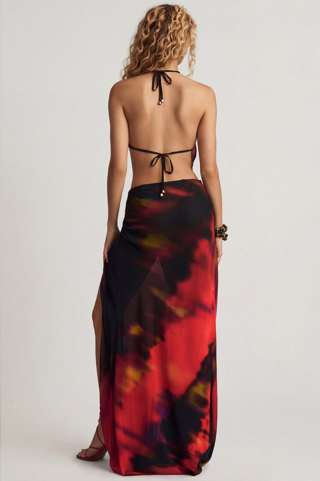 Oh Polly's Juliana Nulu wearing the Keona Maxi Skirt in Red Blurred Print Chiffon fabric perfect for summer beach parties