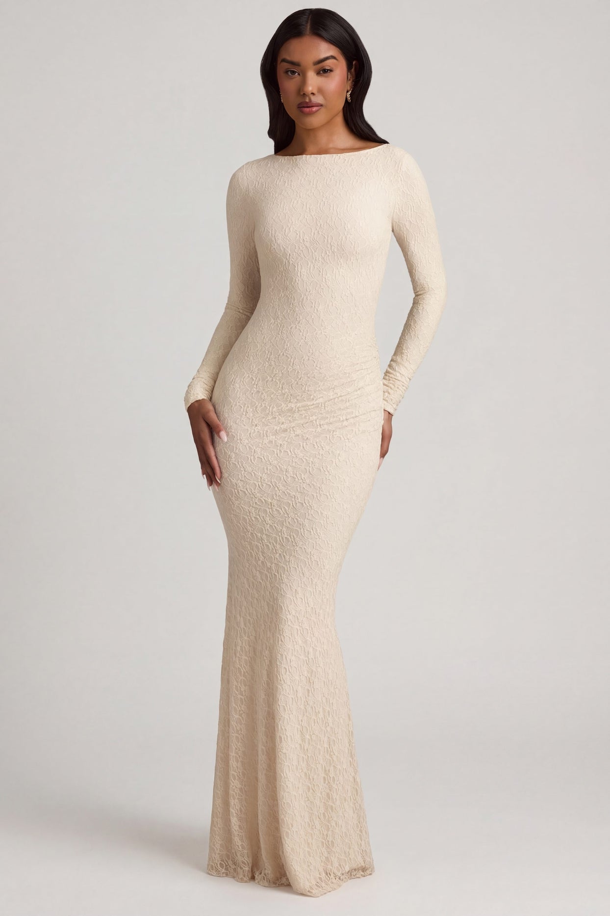 Oh Polly's Yarelis wearing the Tarini Maxi Dress in Ivory Stretch Lace fabric perfect for romantic date nights