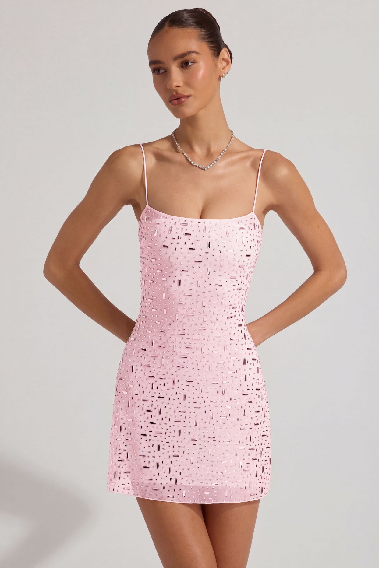 Oh Polly's Anna wearing the Averie Mini Dress in Pink Mesh fabric perfect for summer garden parties
