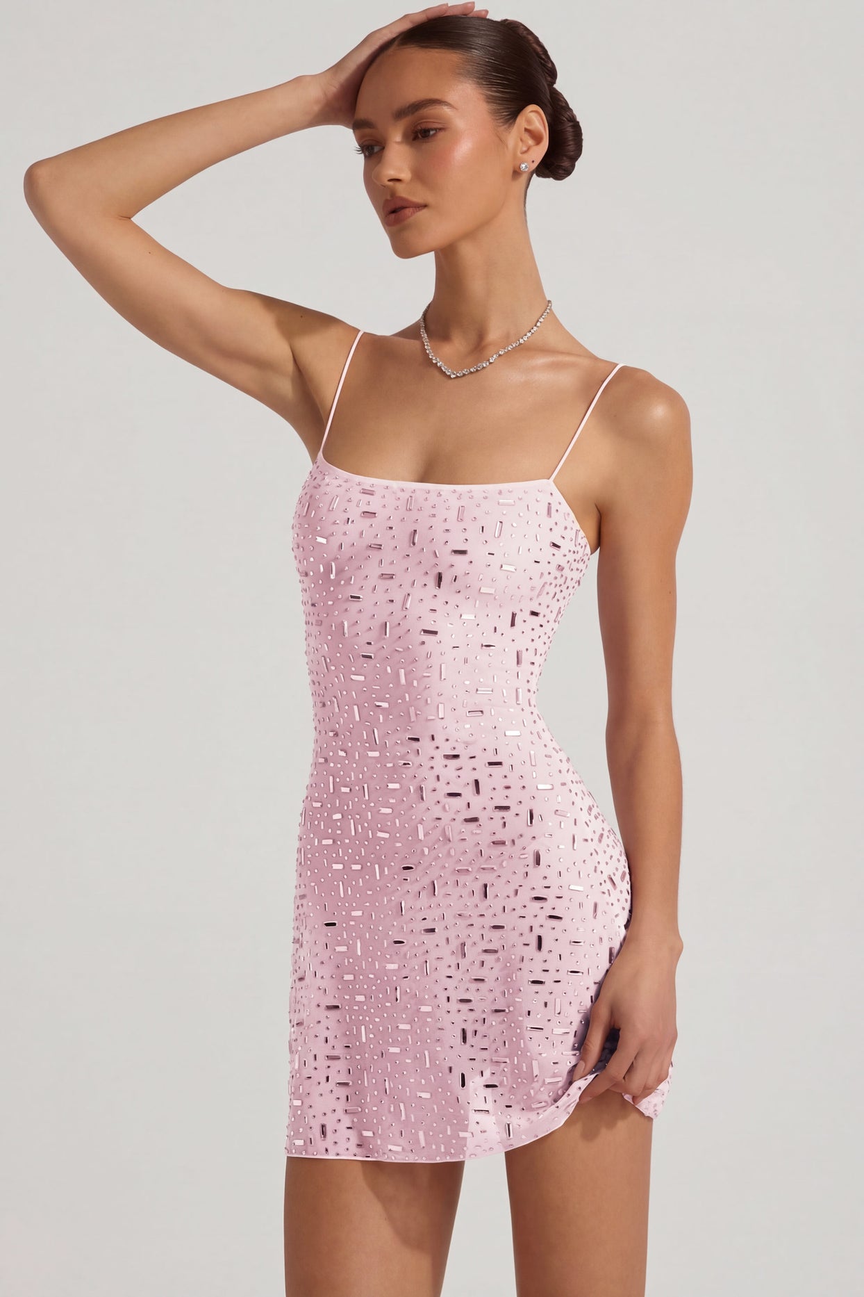 Oh Polly's Anna wearing the Averie Mini Dress in Pink Mesh fabric perfect for rooftop brunch dates
