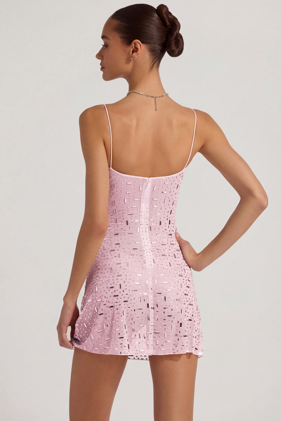 Oh Polly's Anna wearing the Averie Mini Dress in Pink Mesh fabric perfect for rooftop brunch dates