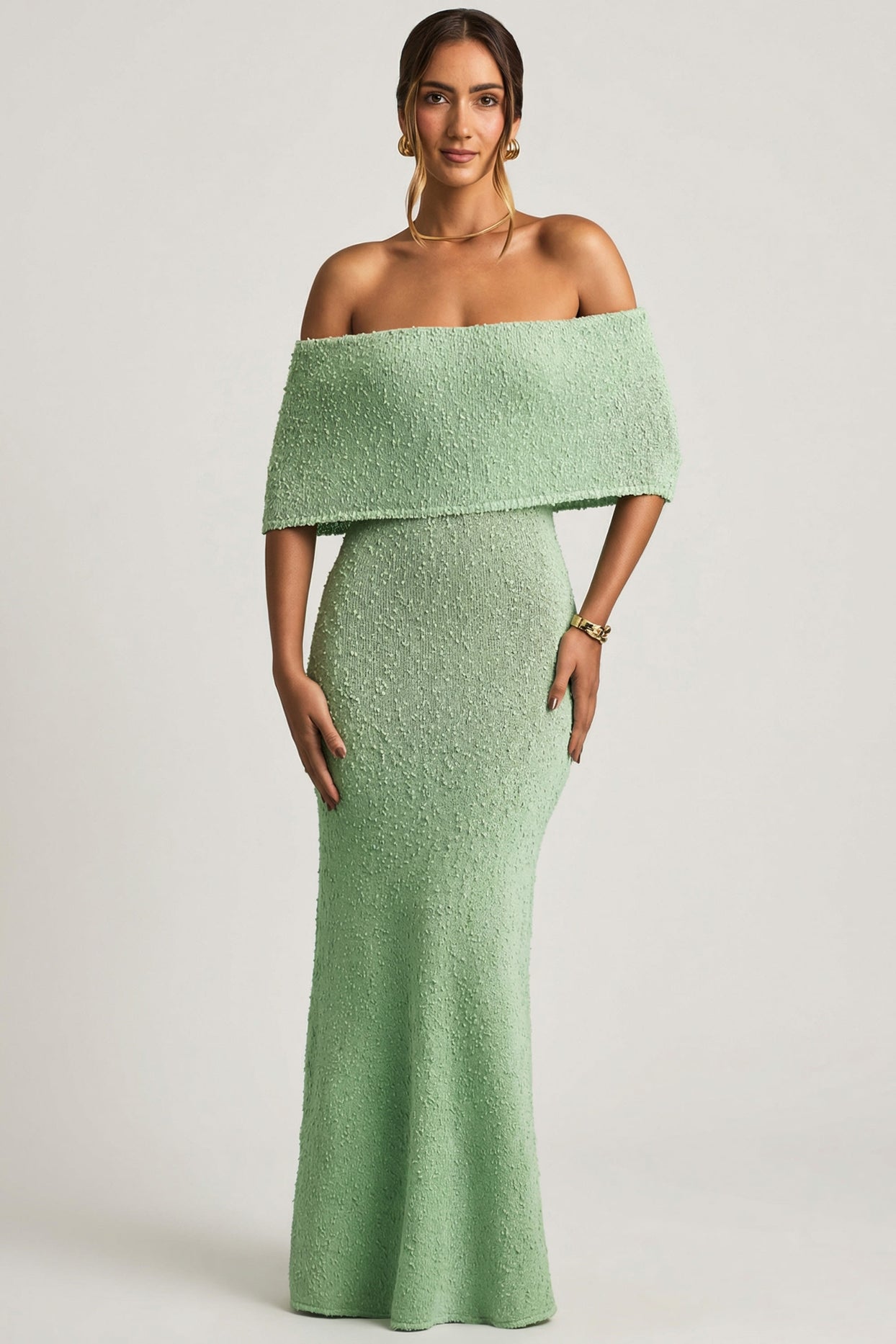 Oh Polly model Priscilla wearing the Naia Maxi Dress in Mint Boucle Knit fabric perfect for summer garden parties
