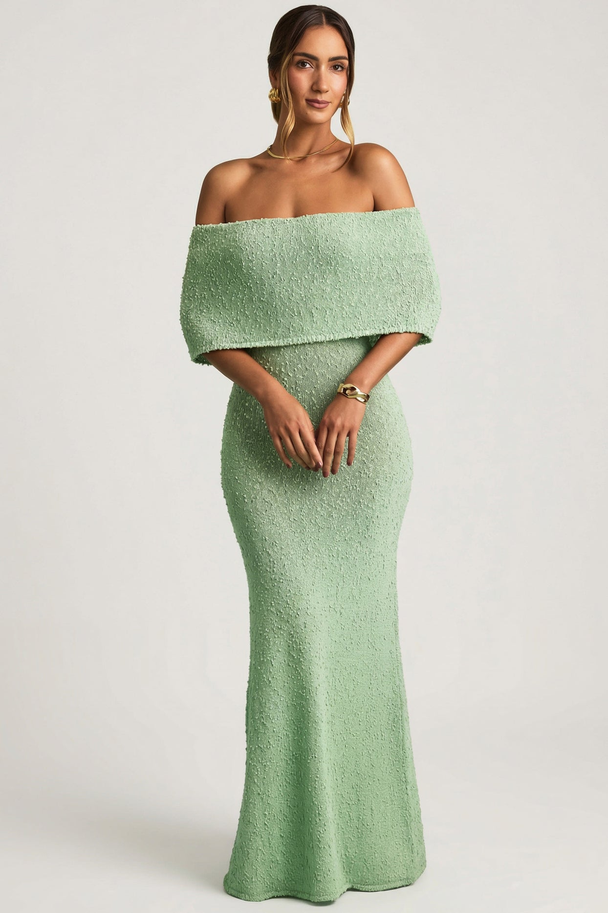 Oh Polly model Priscilla wearing the Naia Maxi Dress in Mint Boucle Knit fabric perfect for date night outings