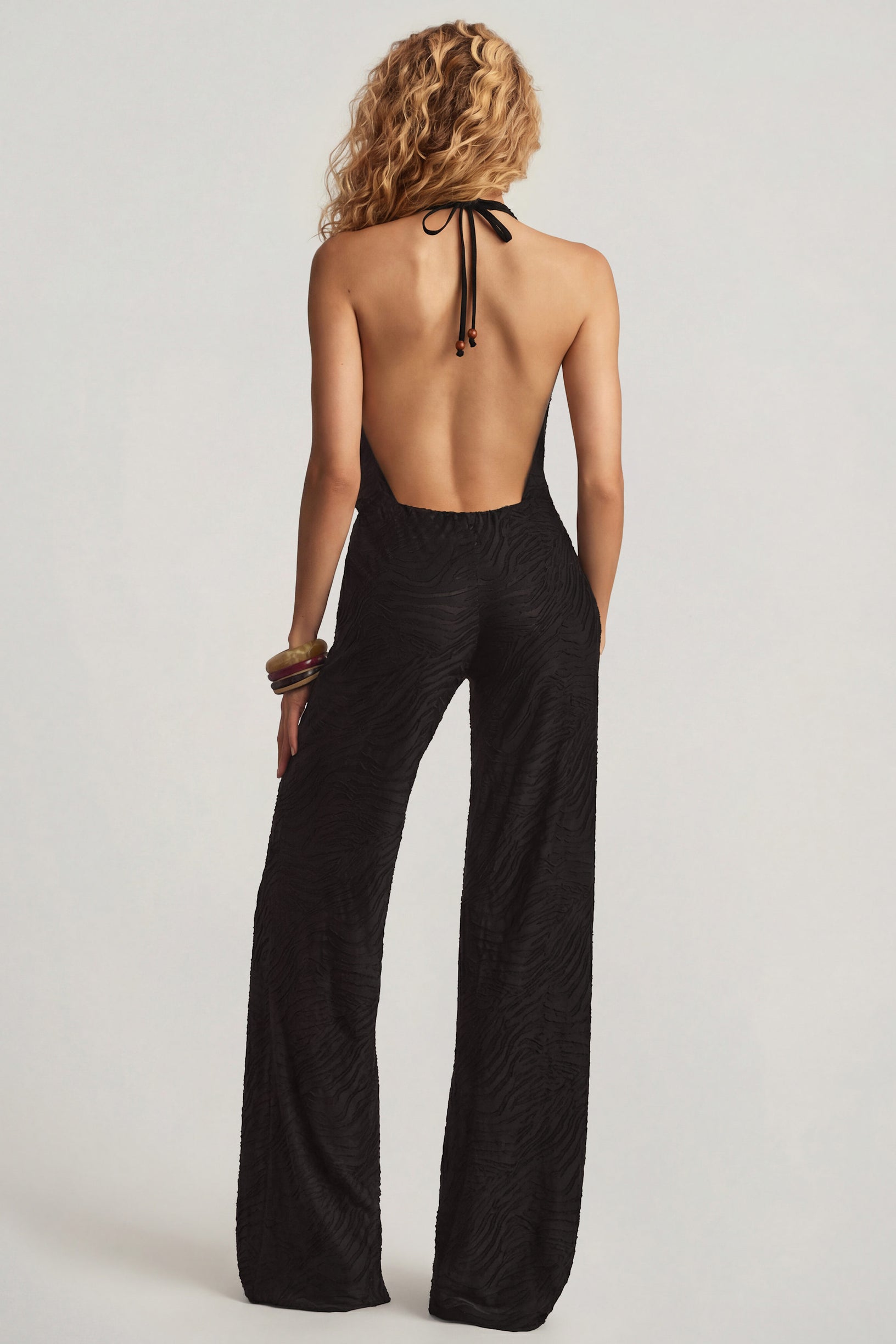 Devoré Halterneck Open-Back Jumpsuit in Black - 2