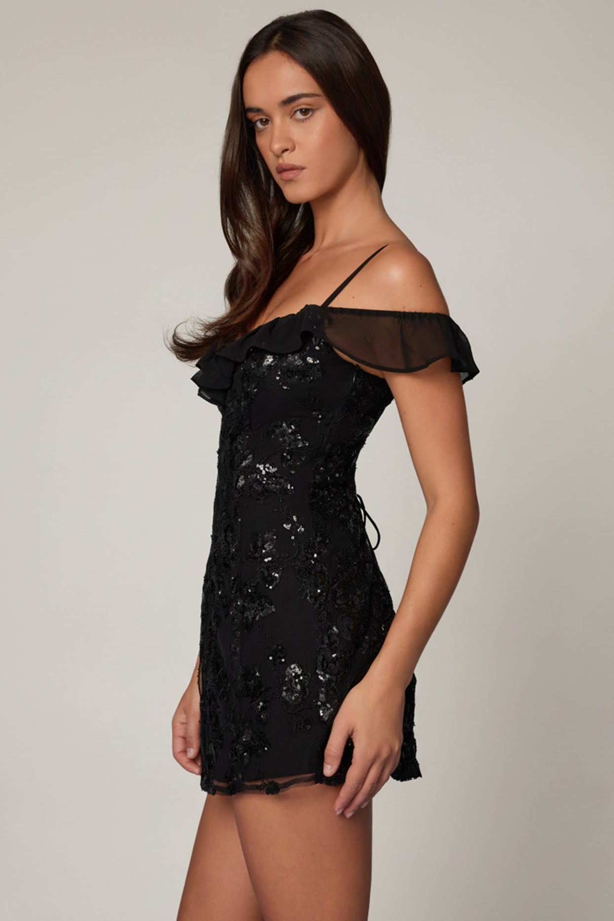Oh Polly's Roberta wearing the Jacira Mini Dress in Black Sequin, Chiffon fabric, perfect for cocktail parties