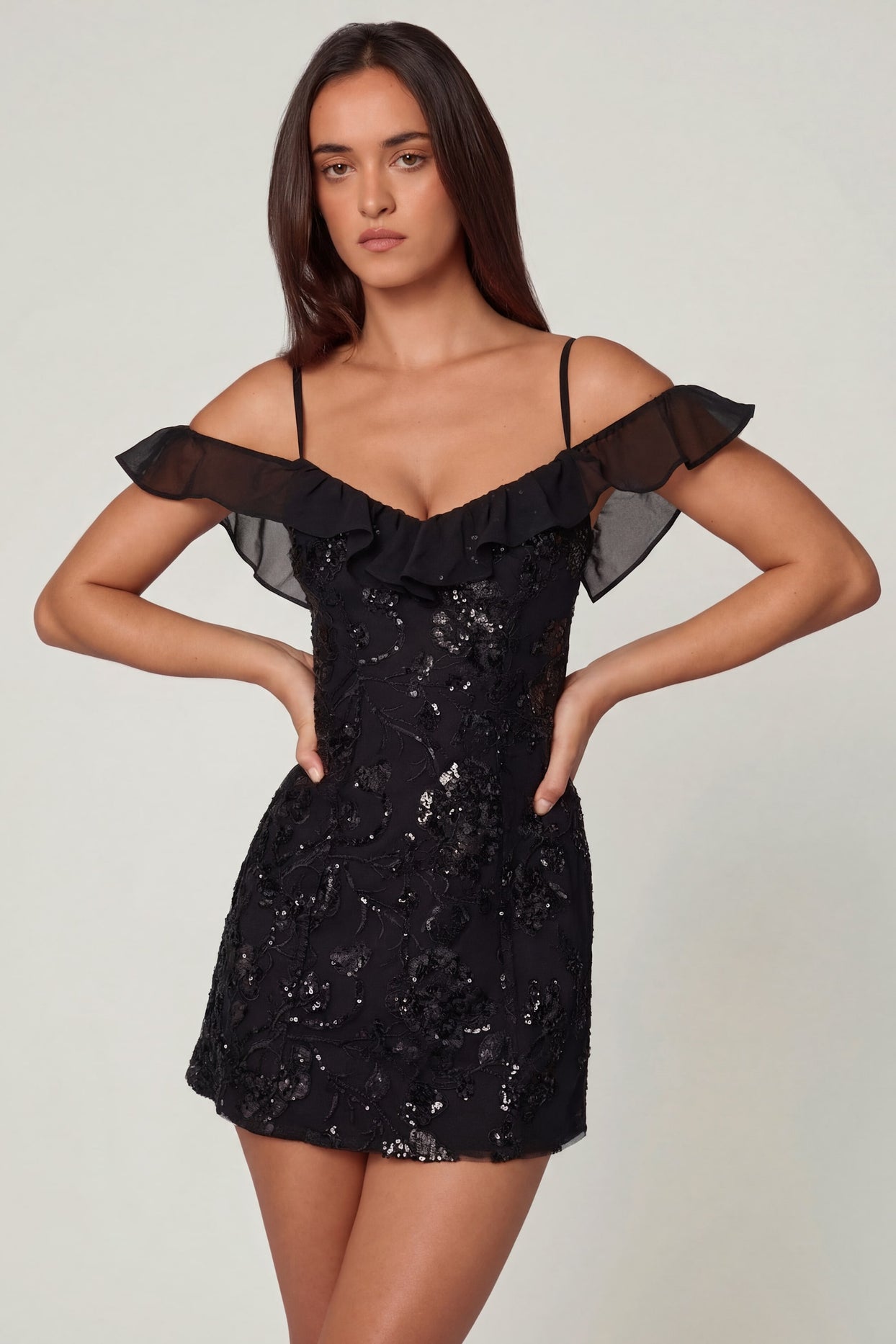 Oh Polly's Roberta wearing the Jacira Mini Dress in Black Sequin, Chiffon fabric, perfect for clubbing nights