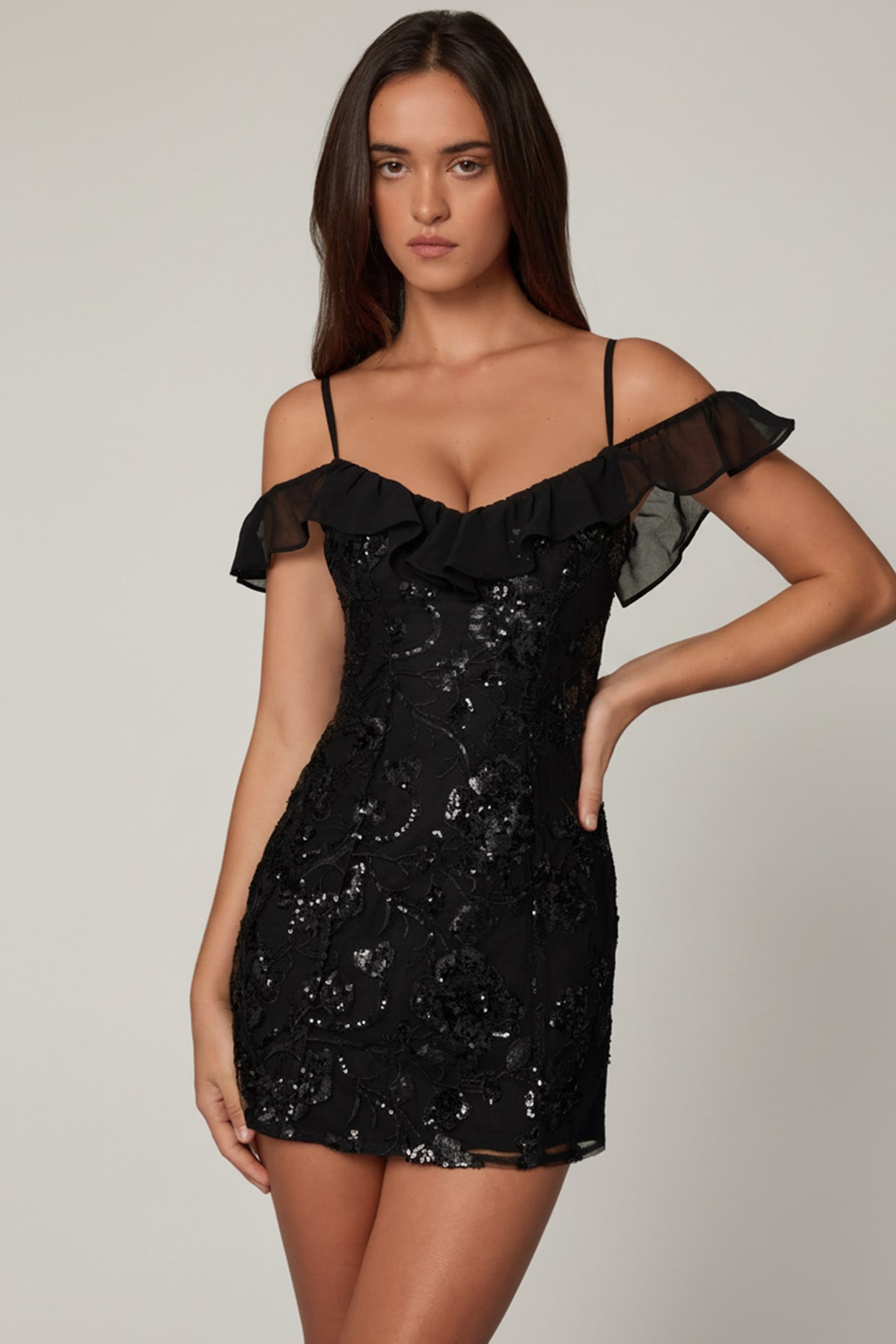 Oh Polly's Roberta wearing the Jacira Mini Dress in Black Sequin, Chiffon fabric, perfect for festive gatherings