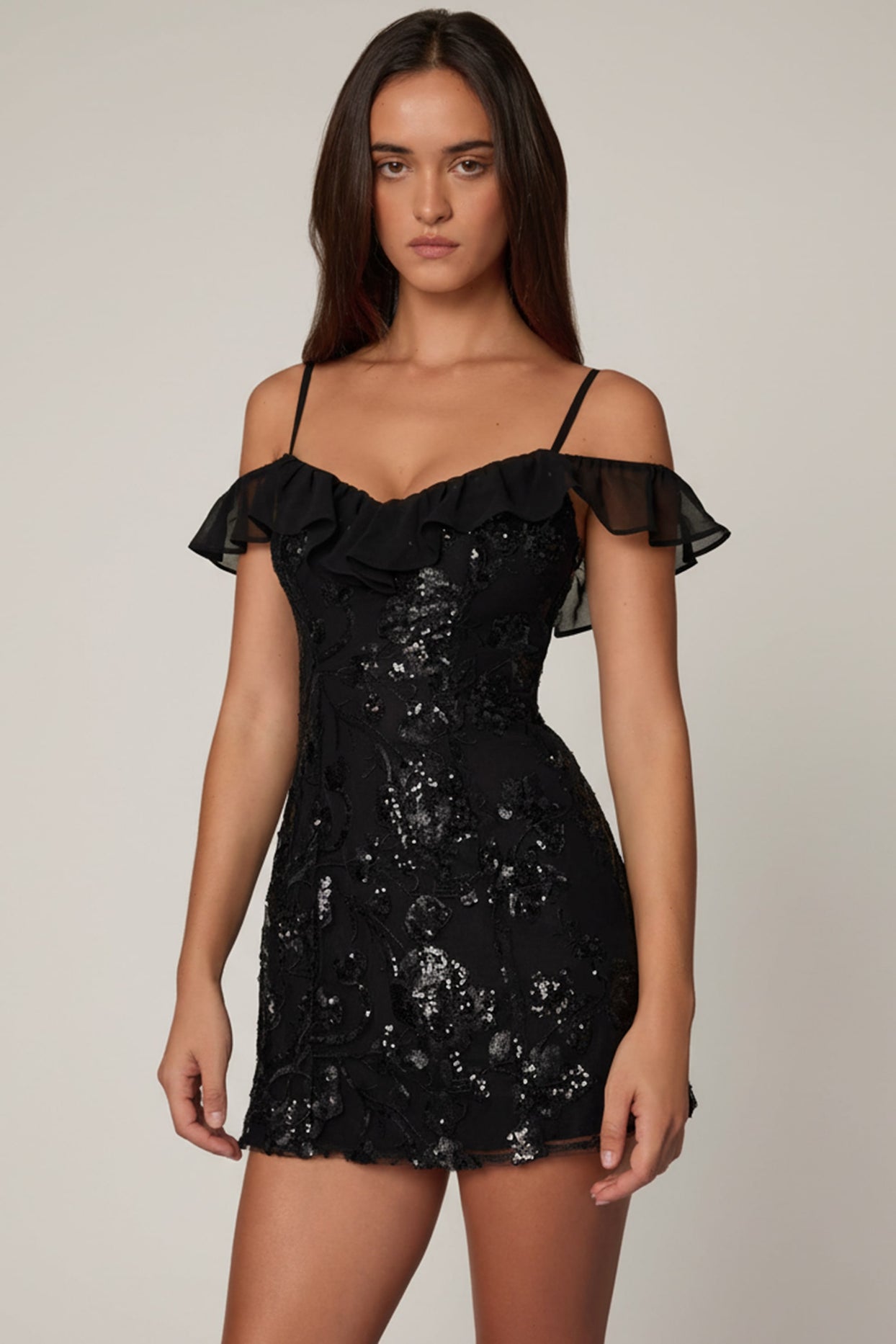 Oh Polly's Roberta wearing the Jacira Mini Dress in Black Sequin, Chiffon fabric, perfect for date nights