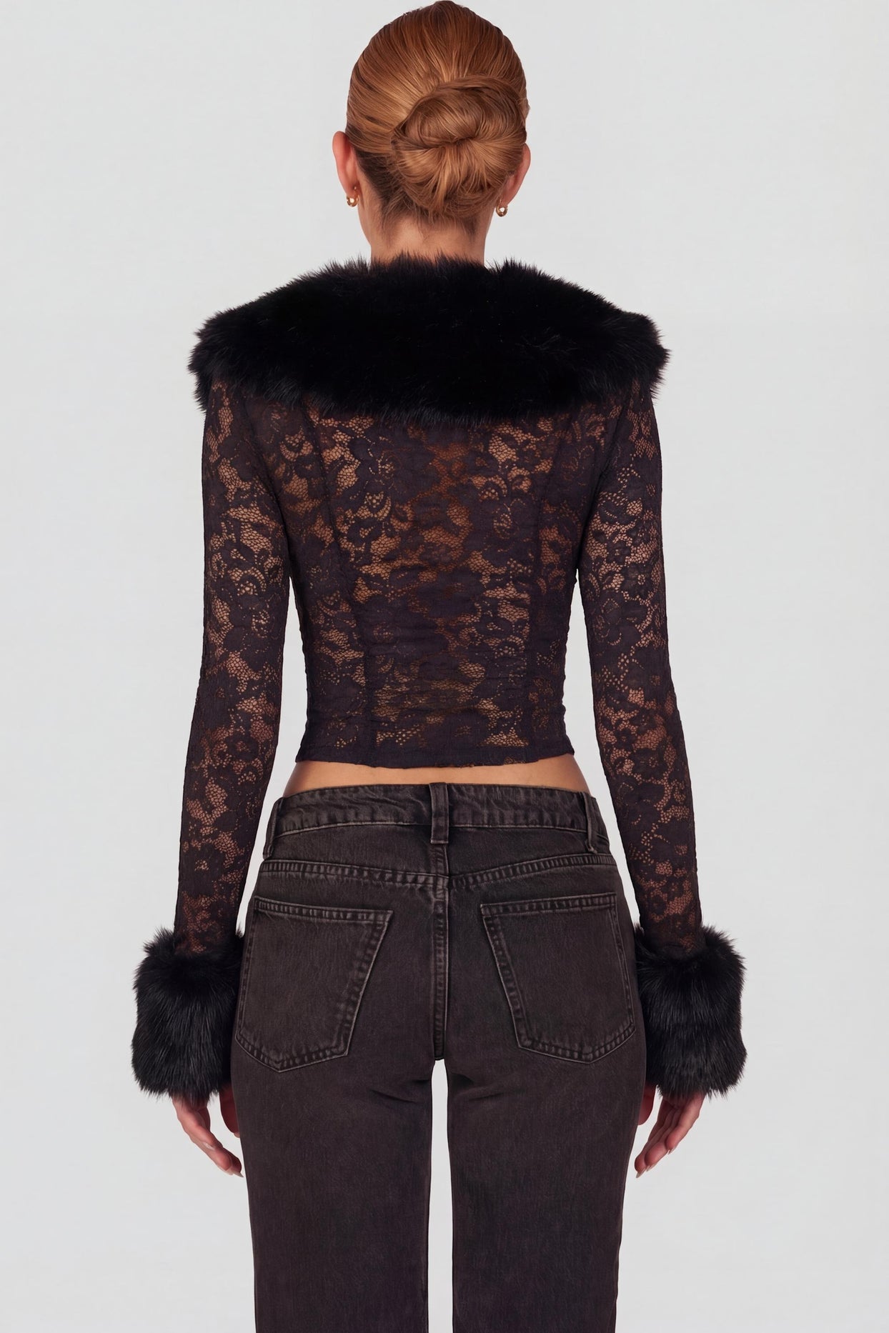Oh Polly's Roberta wearing the Noemy Cardigan in Black Stretch Lace, Faux Fur fabric, perfect for evening parties