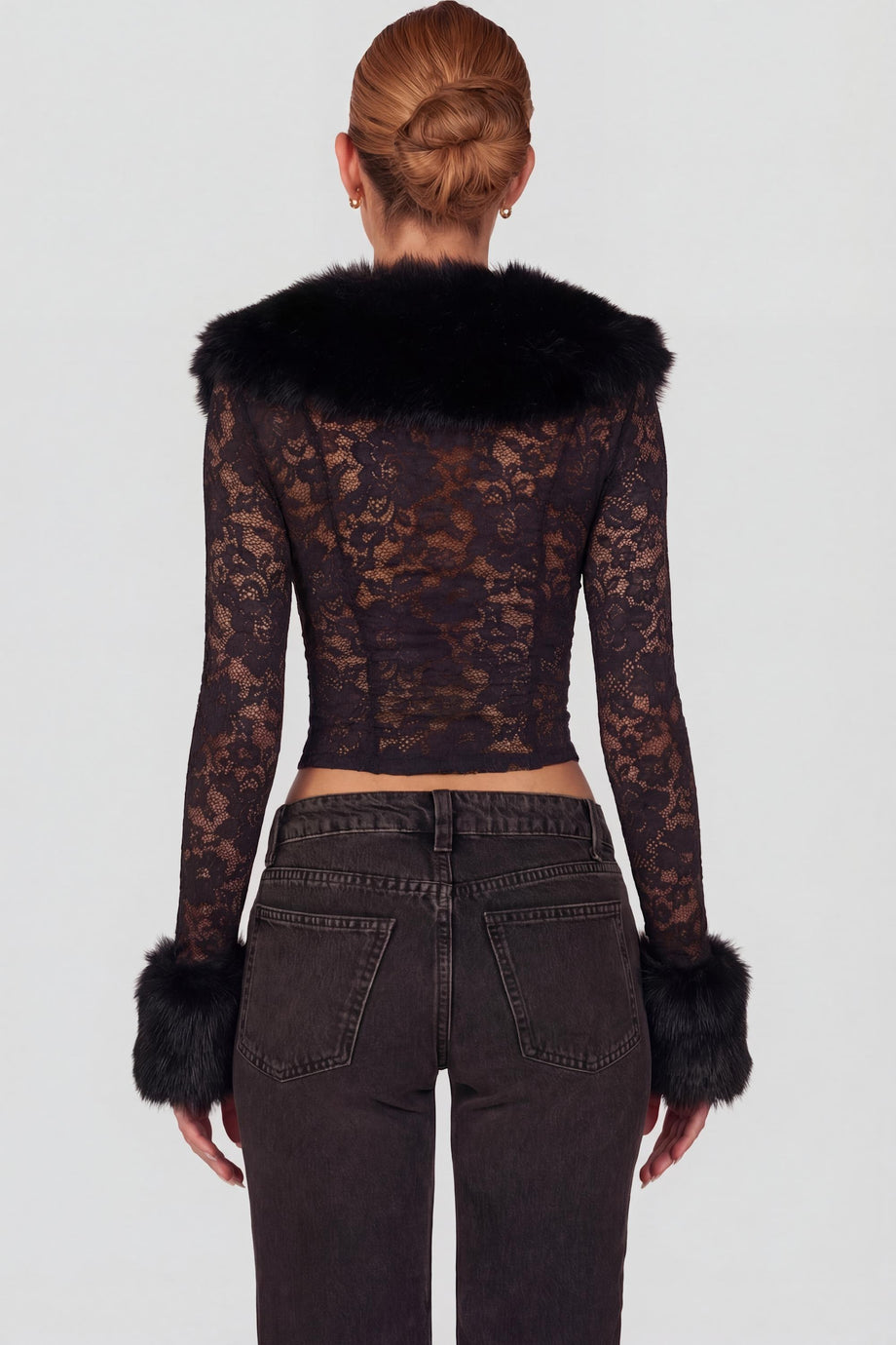 Oh Polly's Roberta wearing the Noemy Cardigan in Black Stretch Lace, Faux Fur fabric, perfect for evening parties