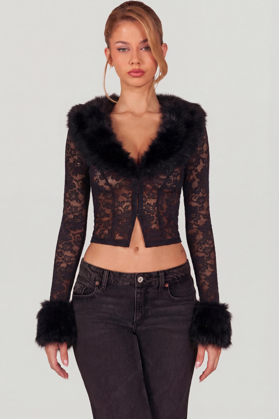 Oh Polly's Roberta wearing the Noemy Cardigan in Black Stretch Lace, Faux Fur fabric, perfect for winter nights out