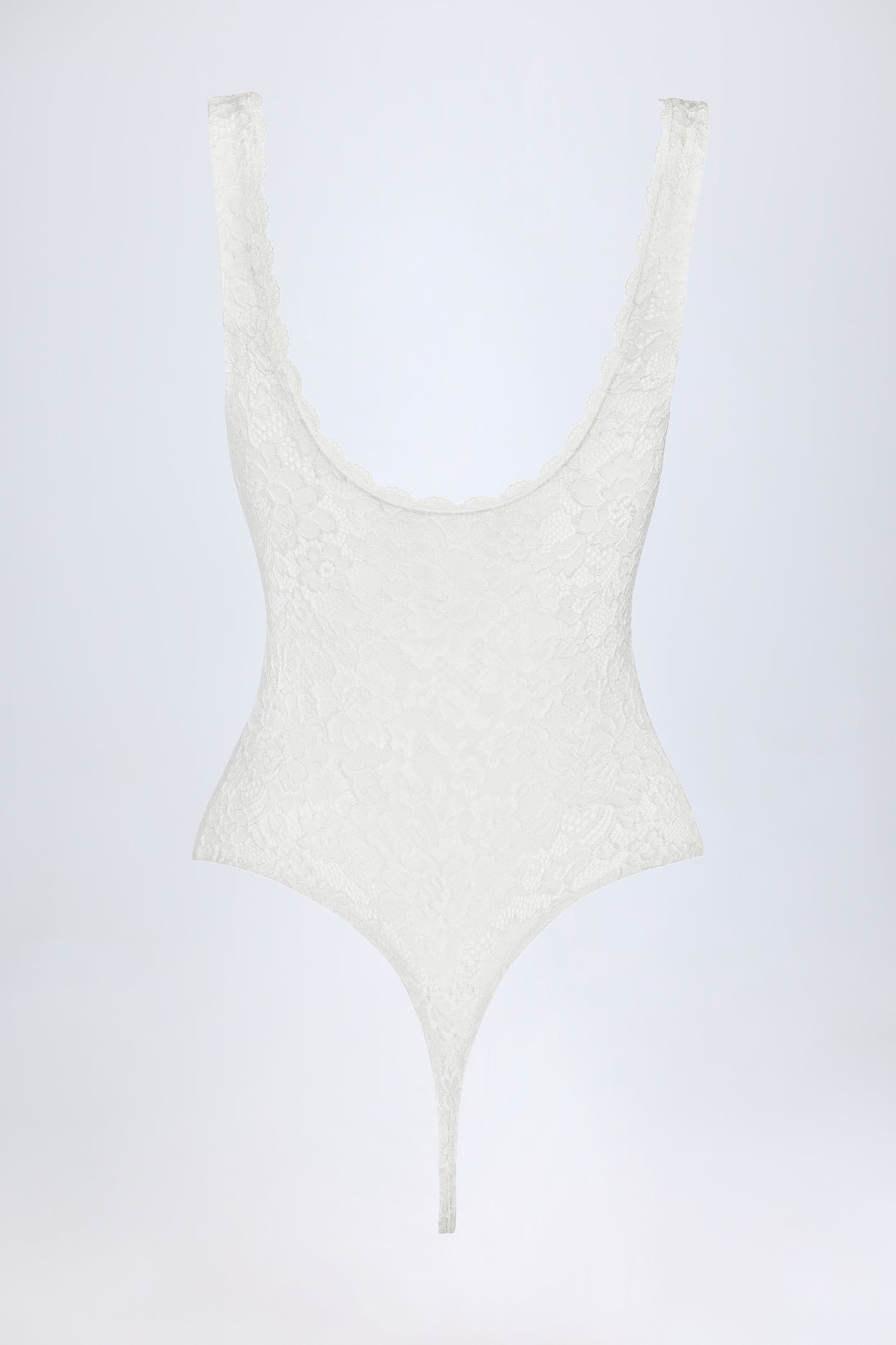 Oh Polly's Roberta wearing the Zayla Bodysuit in White Stretch Lace fabric perfect for rooftop parties