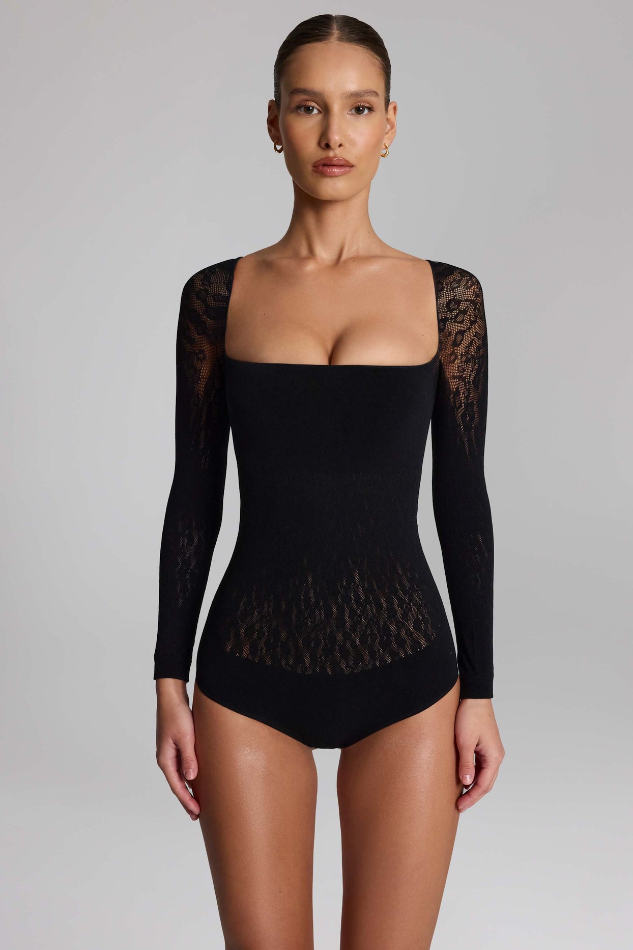 Cap-Sleeve Seamless Knit Bodysuit in Black