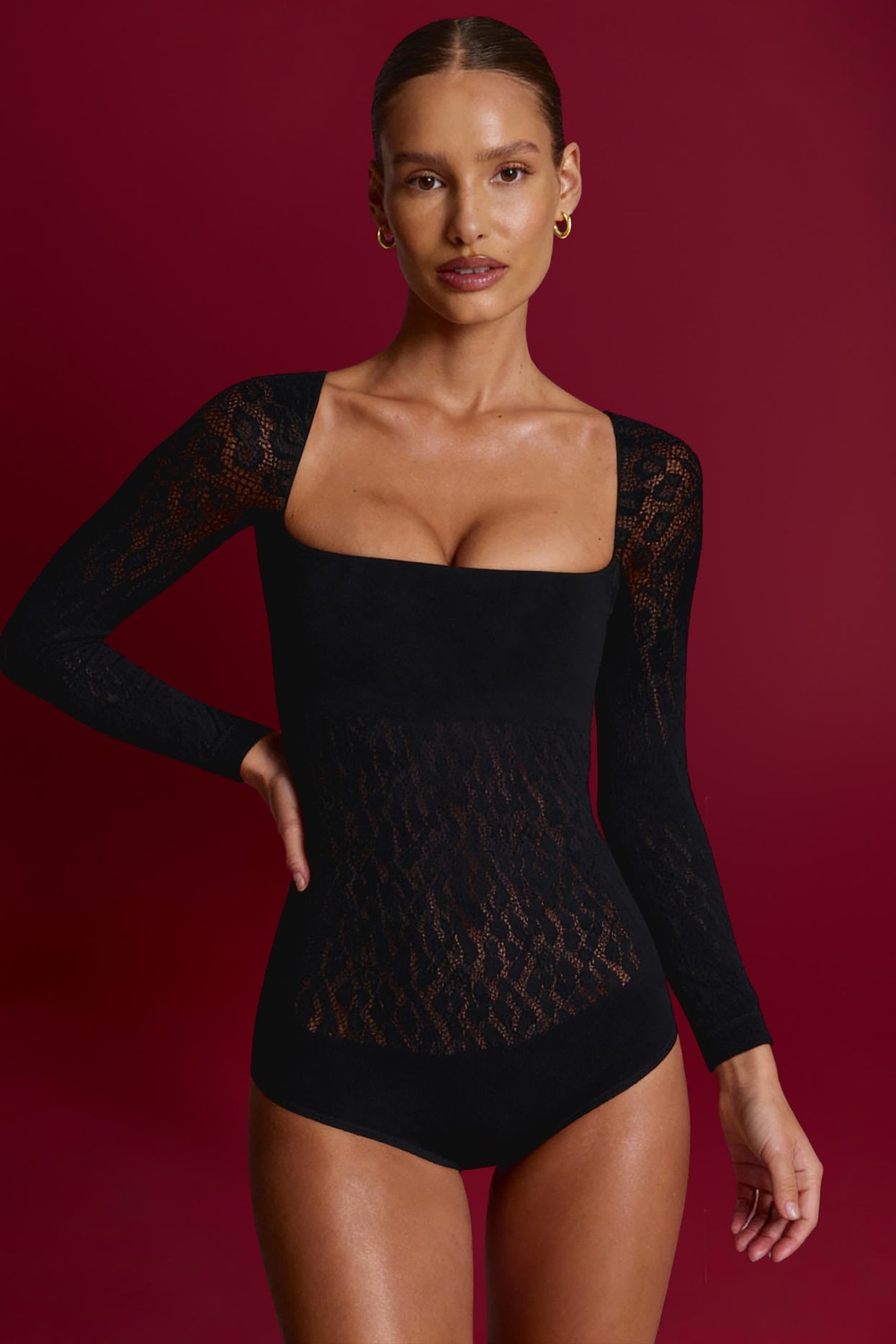 Cap-Sleeve Seamless Knit Bodysuit in Black