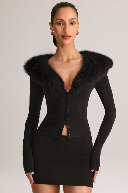 معطف مزين بالفرو الصناعي باللون الأسود
