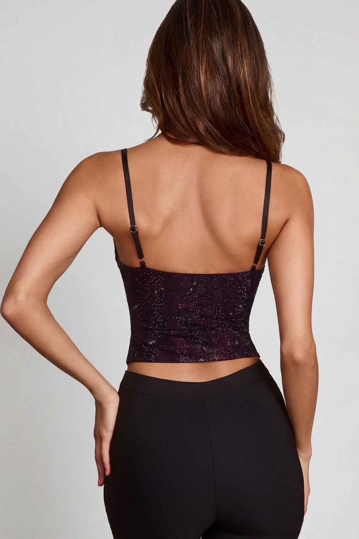 Oh Polly's Yasmin wearing the Armelia Full Top in Purple Snake Square Hotfix fabric perfect for a night out
