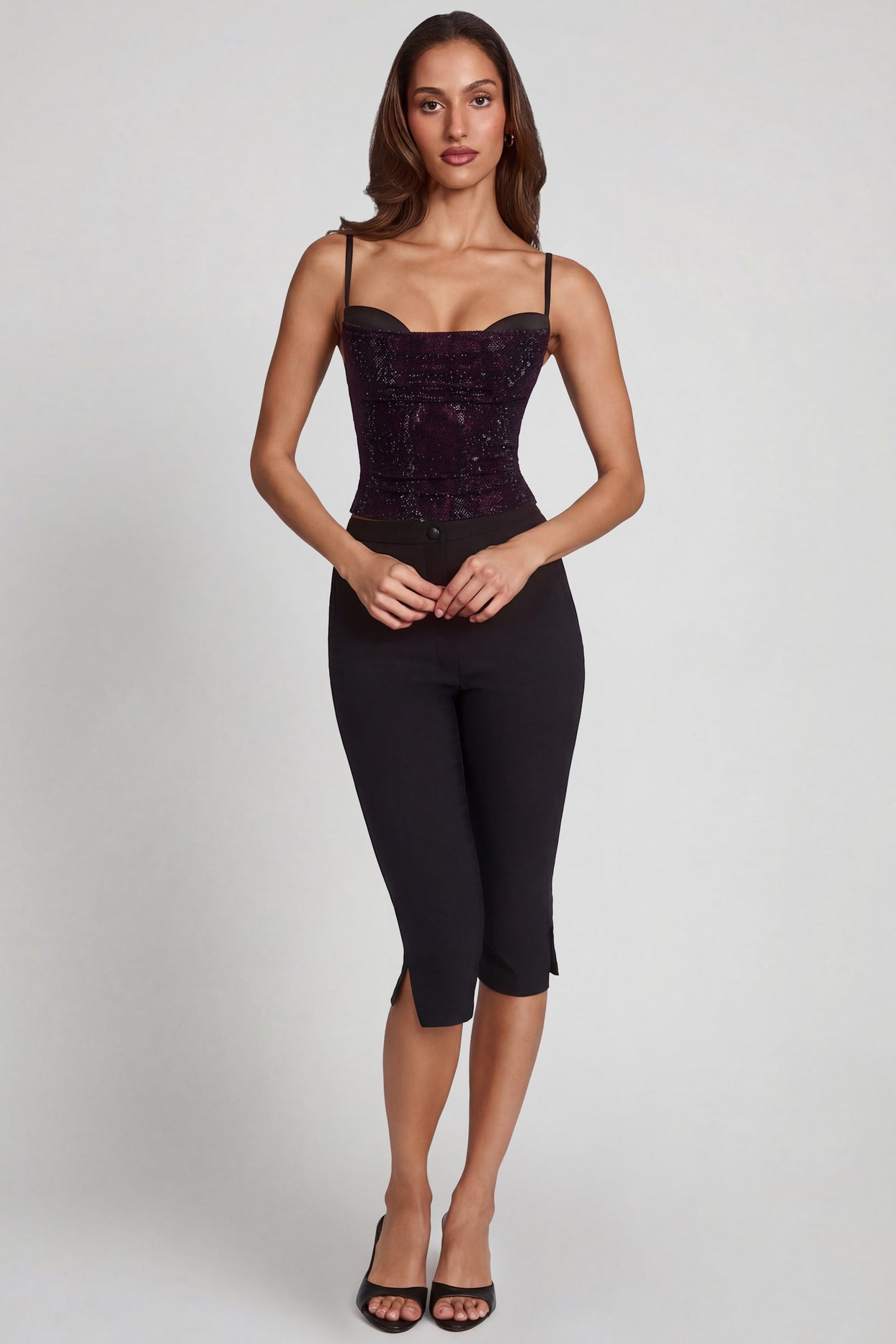 Oh Polly's Yasmin wearing the Armelia Full Top in Purple Snake Square Hotfix fabric perfect for a night out