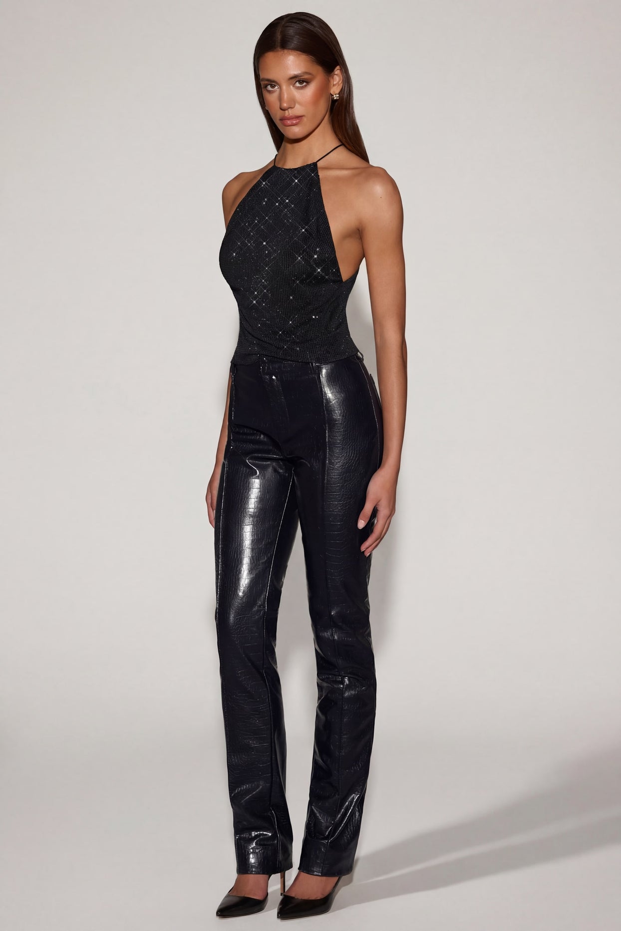 Oh Polly's Kayla wearing the Nemyra Regular Trousers in Black Croc PU fabric perfect for cocktail parties