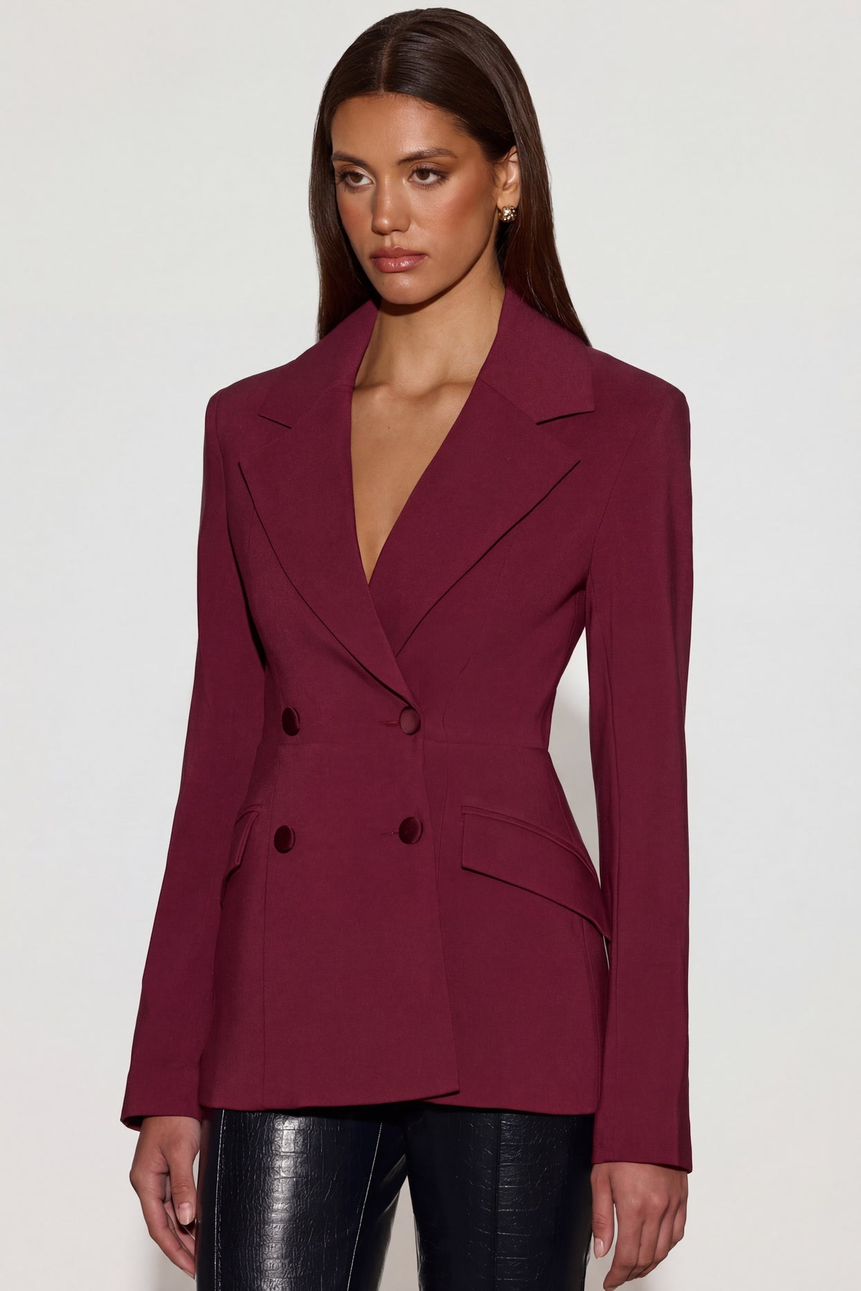 Oh Polly's Kayla wearing the Marika Blazer in Burgundy Poly Span fabric perfect for cocktail parties