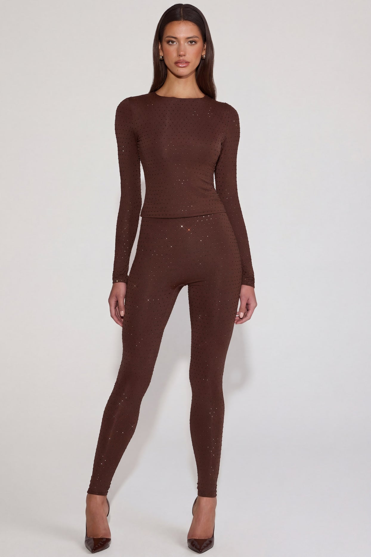 Oh Polly's Kayla wearing the Cassie Leggings in Chocolate Brown Square Hotfix fabric perfect for girls' night out