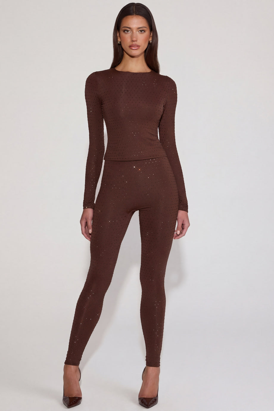 Oh Polly's Kayla wearing the Cassie Leggings in Chocolate Brown Square Hotfix fabric perfect for girls' night out