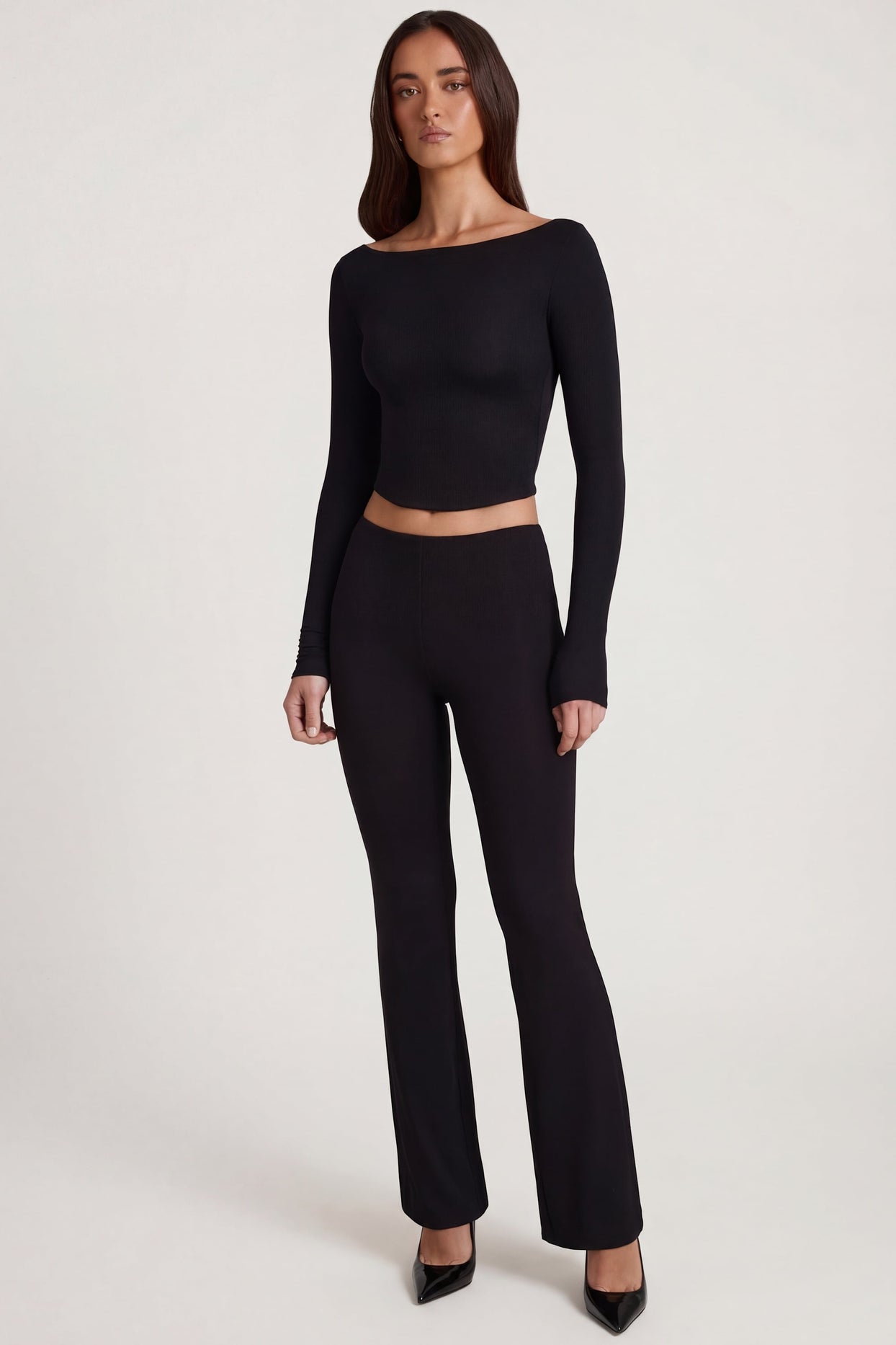 Oh Polly's Roberta wearing the Vevina Regular Trousers in Black Modal fabric perfect for office meetings