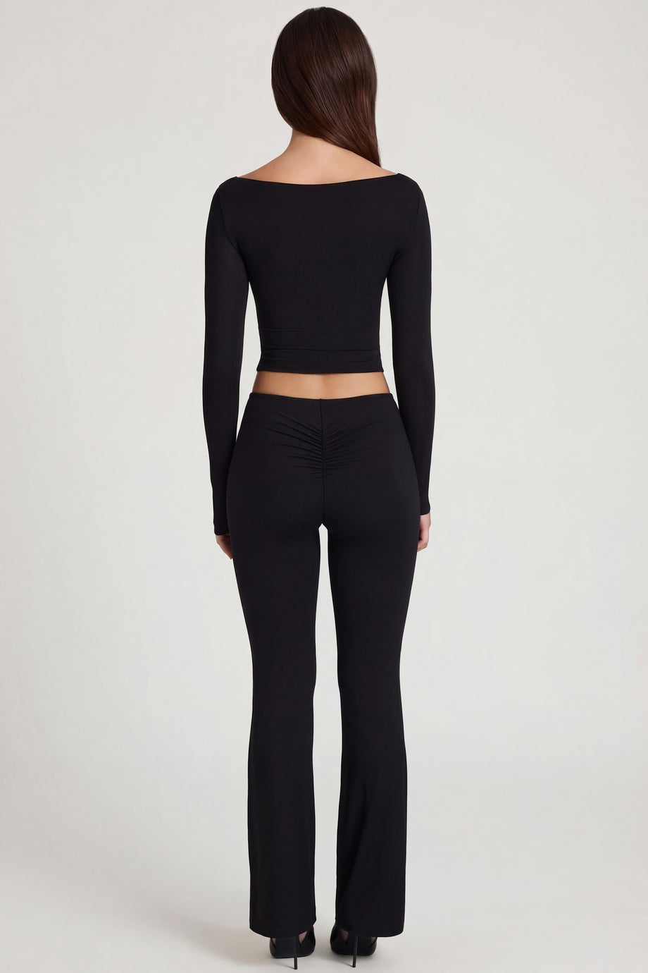 Oh Polly's Roberta wearing the Vevina Regular Trousers in Black Modal fabric perfect for dinner dates