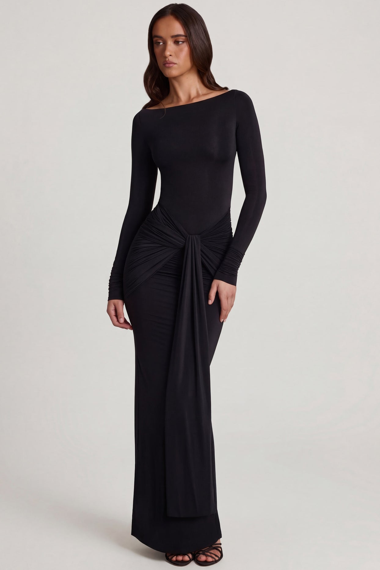 Oh Polly's Roberta wearing the Mericia Maxi Dress in Black Sheer Jersey fabric perfect for rooftop events