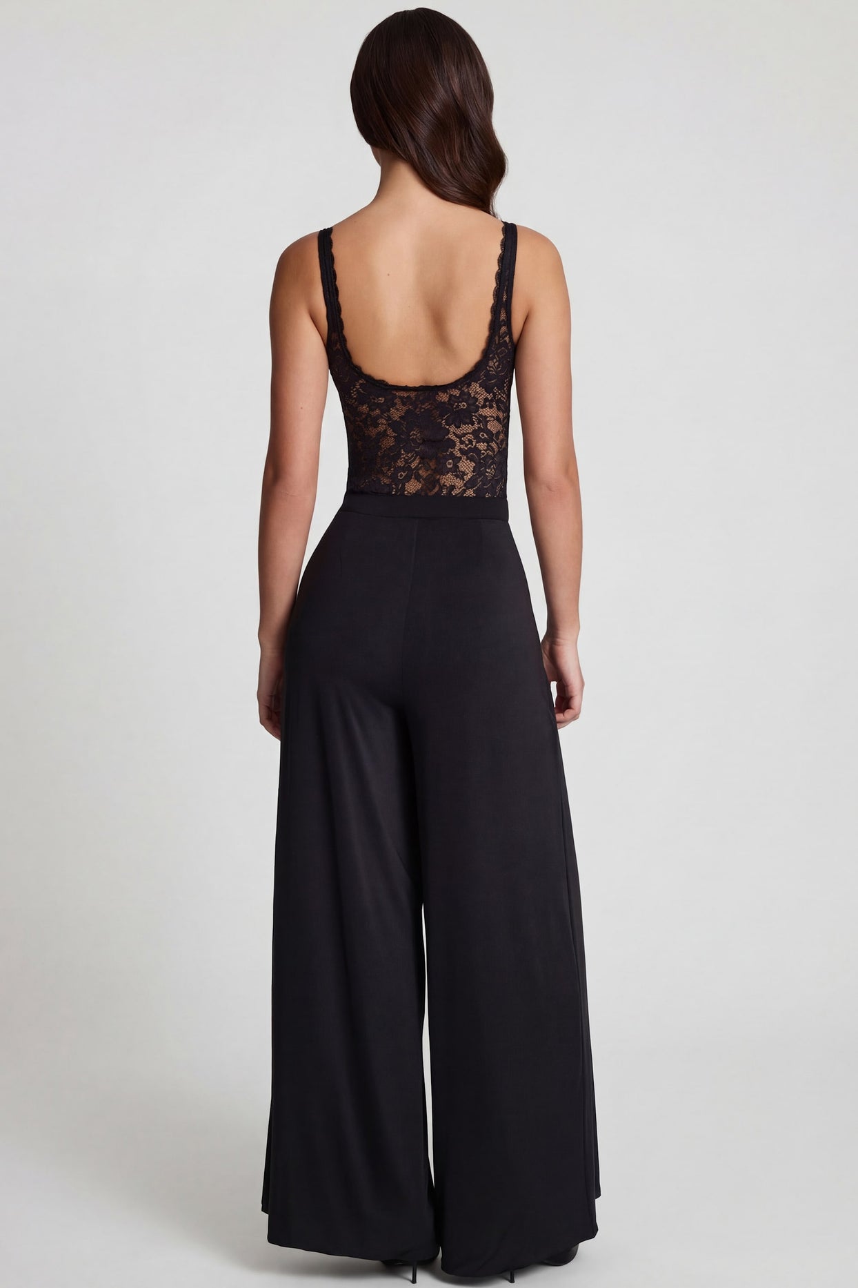 Oh Polly's Roberta wearing the Zafira Regular Trousers in Black Sheer Jersey fabric perfect for a night out