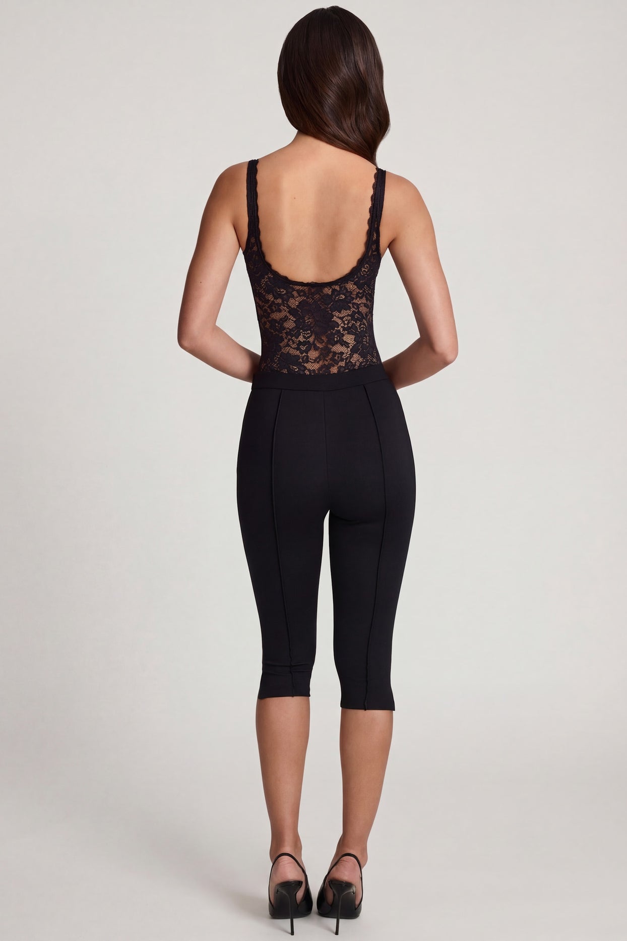 Oh Polly's Roberta wearing the Giuliana Leggings in Black Pointelle fabric perfect for gym workouts