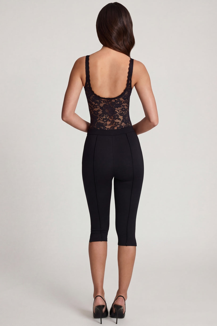 Oh Polly's Roberta wearing the Giuliana Leggings in Black Pointelle fabric perfect for gym workouts