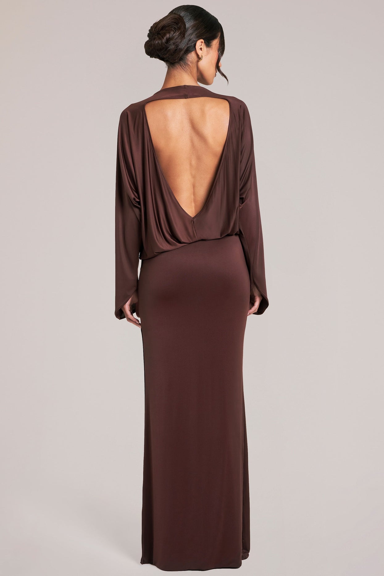 Oh Polly model Yasmin wearing the Lani Maxi Dress in Chocolate Brown Soft Jersey fabric perfect for evening events