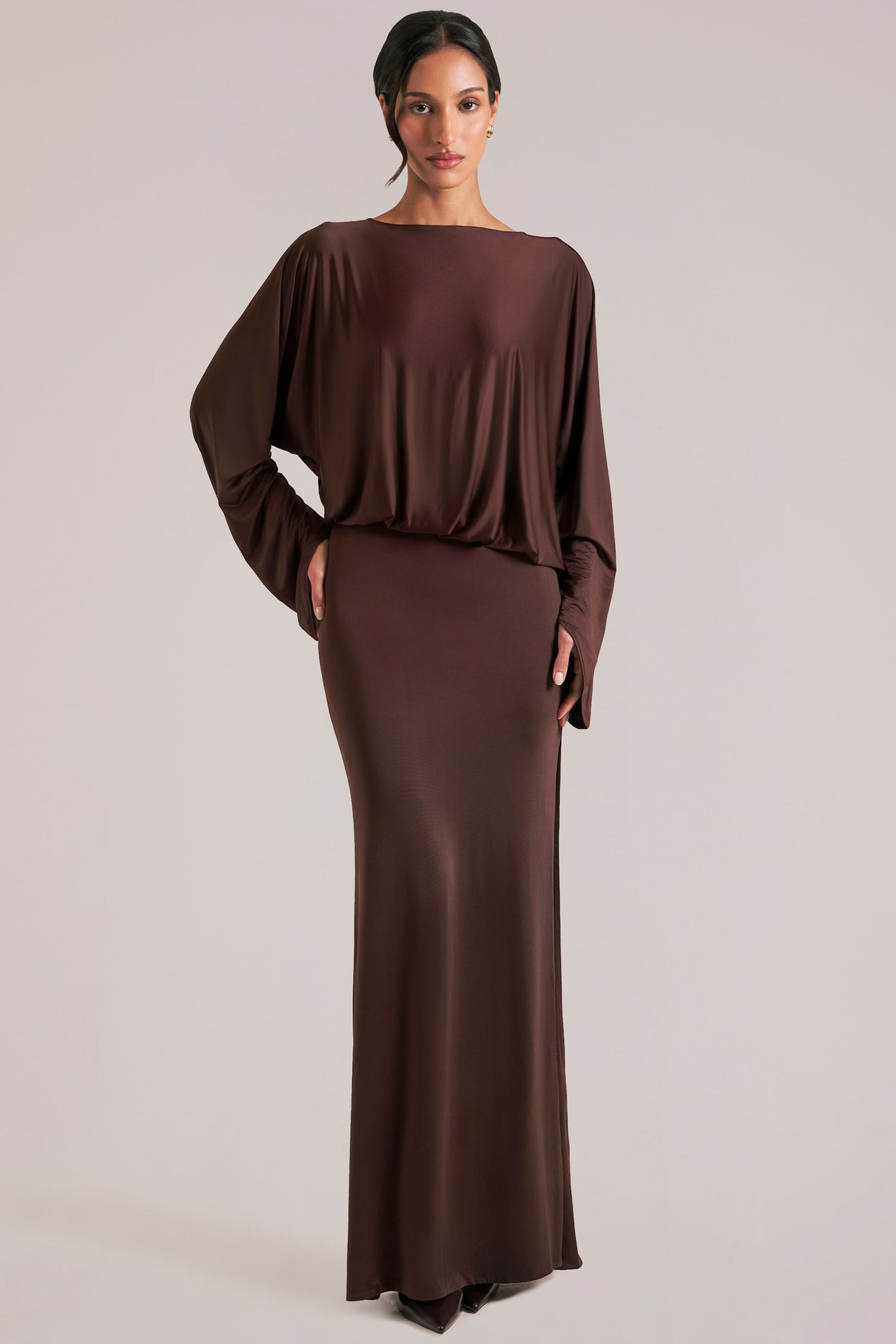 Oh Polly model Yasmin wearing the Lani Maxi Dress in Chocolate Brown Soft Jersey fabric perfect for dinner outings