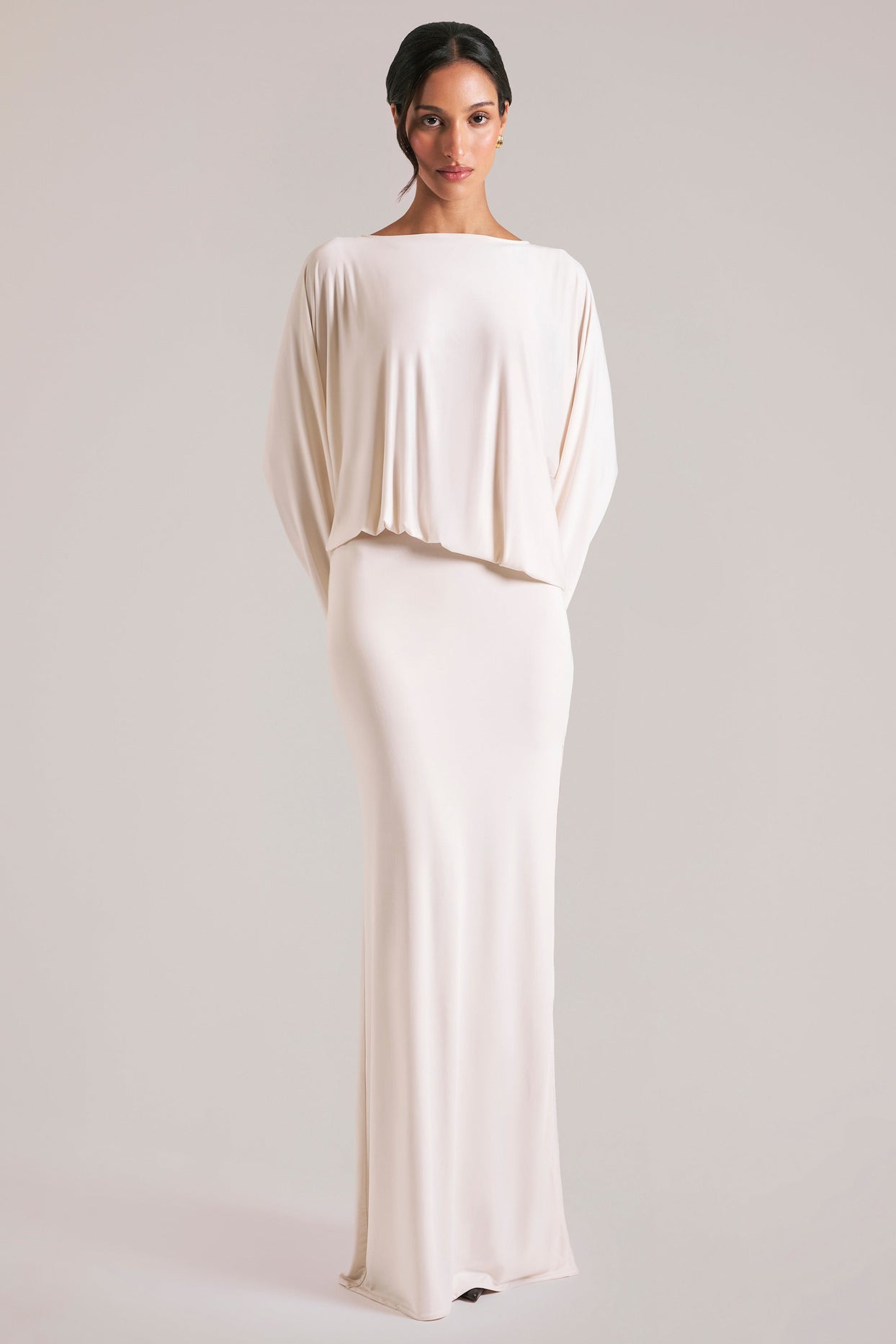 Oh Polly model Yasmin wearing the Lani Maxi Dress in Ivory Soft Jersey fabric perfect for summer garden parties