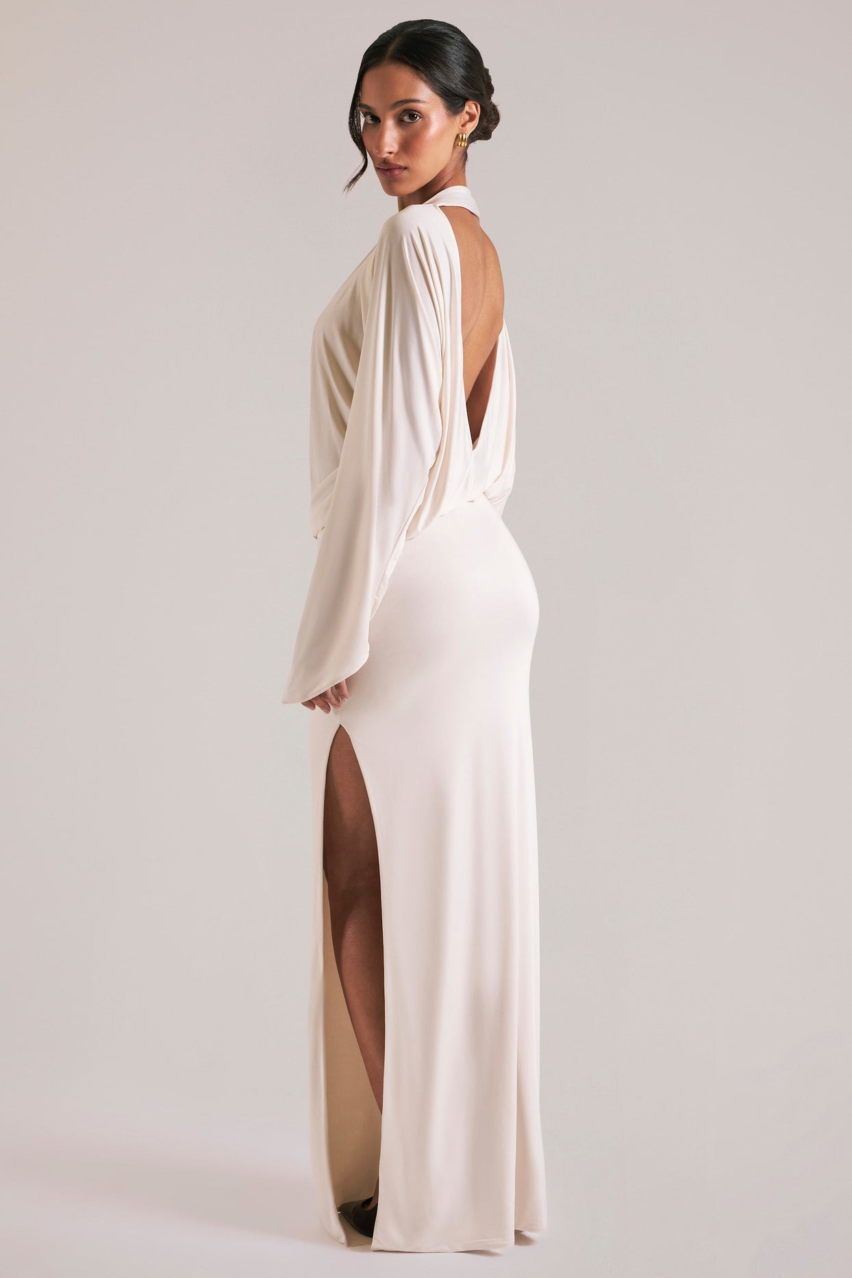 Oh Polly model Yasmin wearing the Lani Maxi Dress in Ivory Soft Jersey fabric perfect for bridal showers