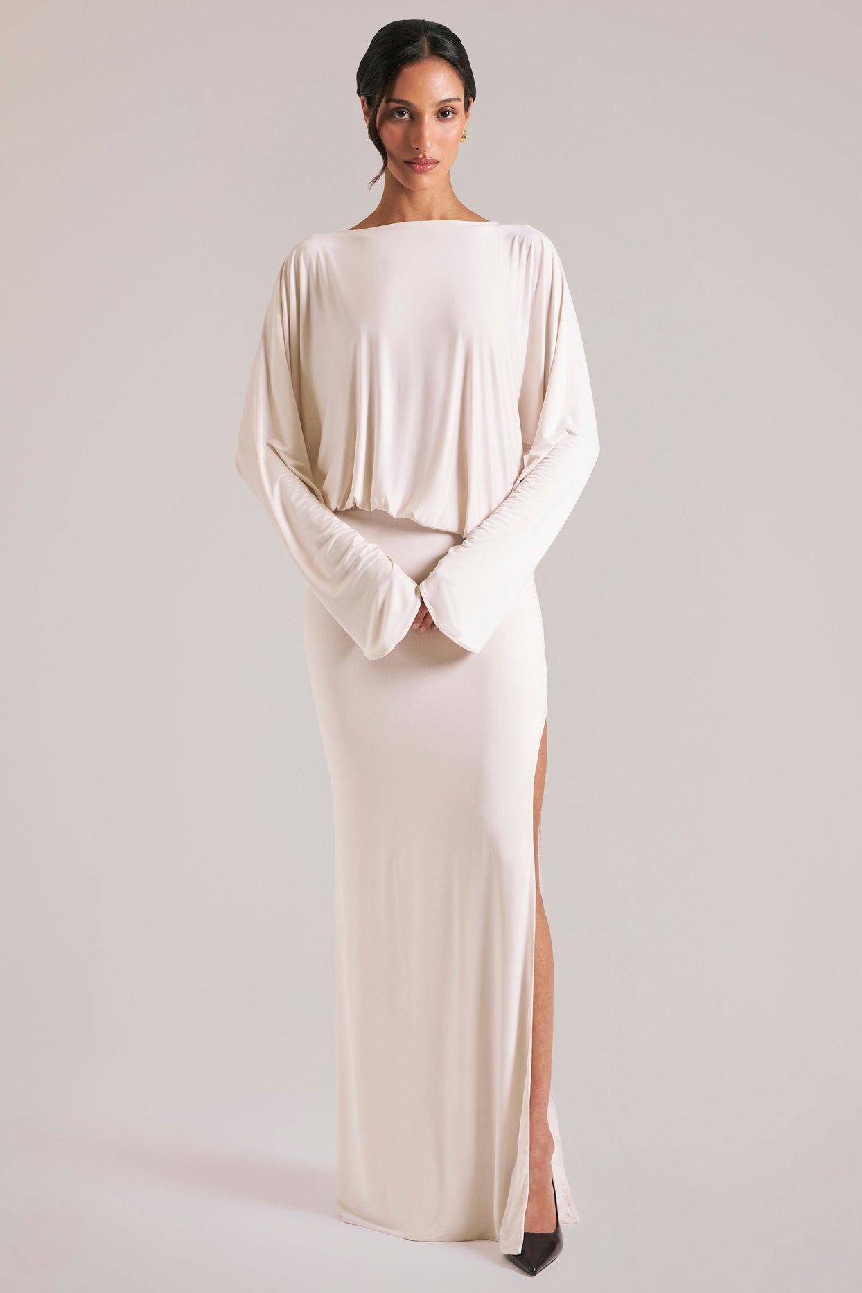 Oh Polly model Yasmin wearing the Lani Maxi Dress in Ivory Soft Jersey fabric perfect for chic brunch outings