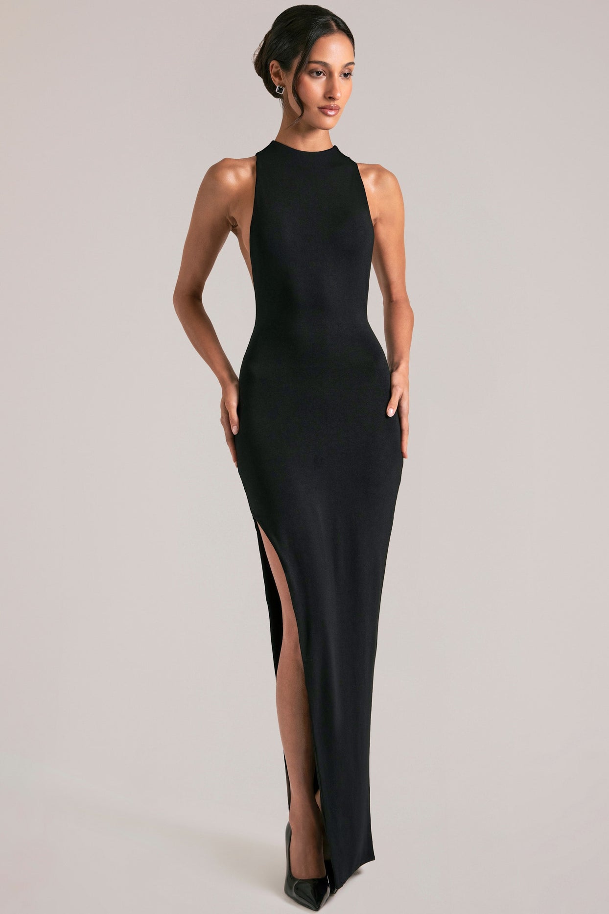 Oh Polly model Yasmin wearing the Mayda Maxi Dress in Black Soft Jersey fabric perfect for date night