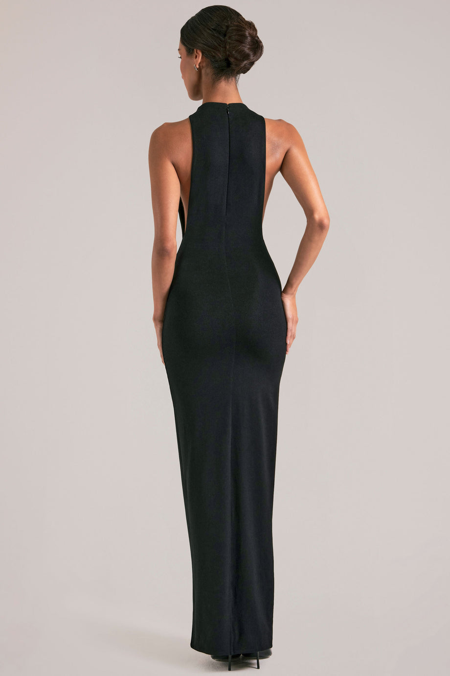 Oh Polly model Yasmin wearing the Mayda Maxi Dress in Black Soft Jersey fabric perfect for girls night out