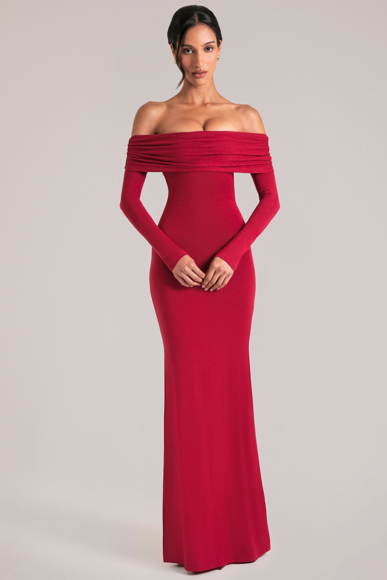Oh Polly model Yasmin wearing the Depny Maxi Dress in Cherry Red Modal fabric perfect for summer weddings