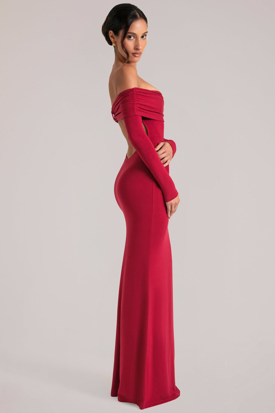 Oh Polly model Yasmin wearing the Depny Maxi Dress in Cherry Red Modal fabric perfect for date night elegance