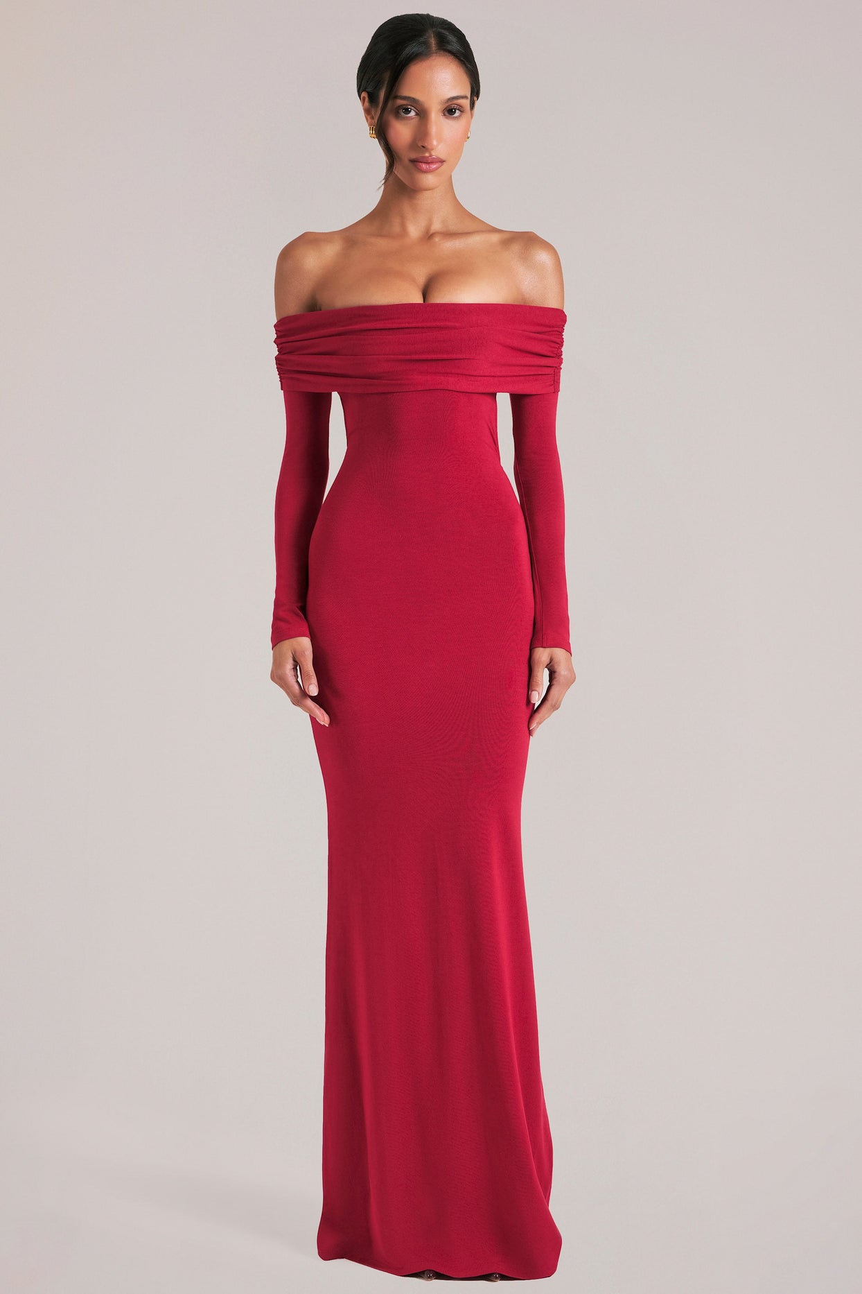 Oh Polly model Yasmin wearing the Depny Maxi Dress in Cherry Red Modal fabric perfect for summer weddings
