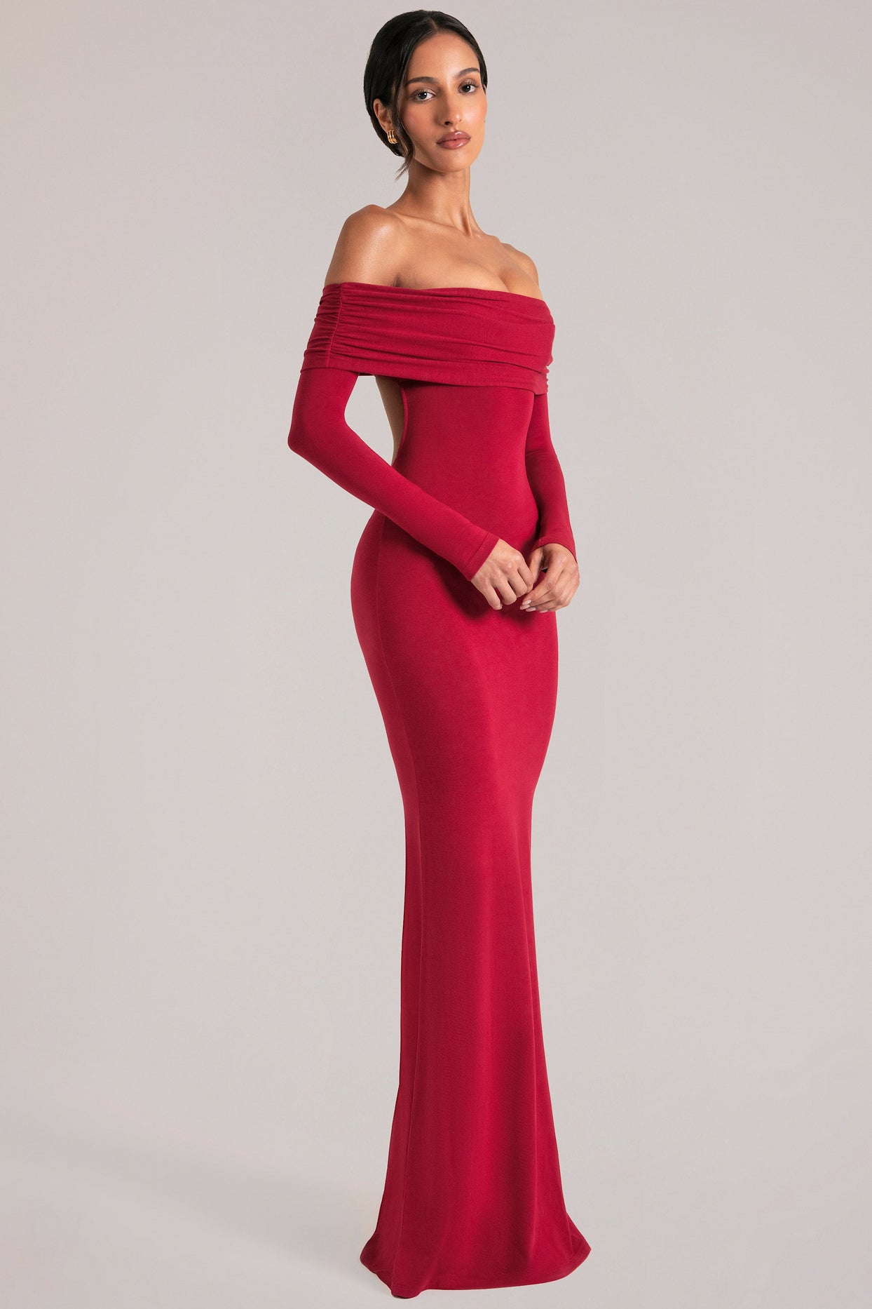 Oh Polly model Yasmin wearing the Depny Maxi Dress in Cherry Red Modal fabric perfect for summer weddings