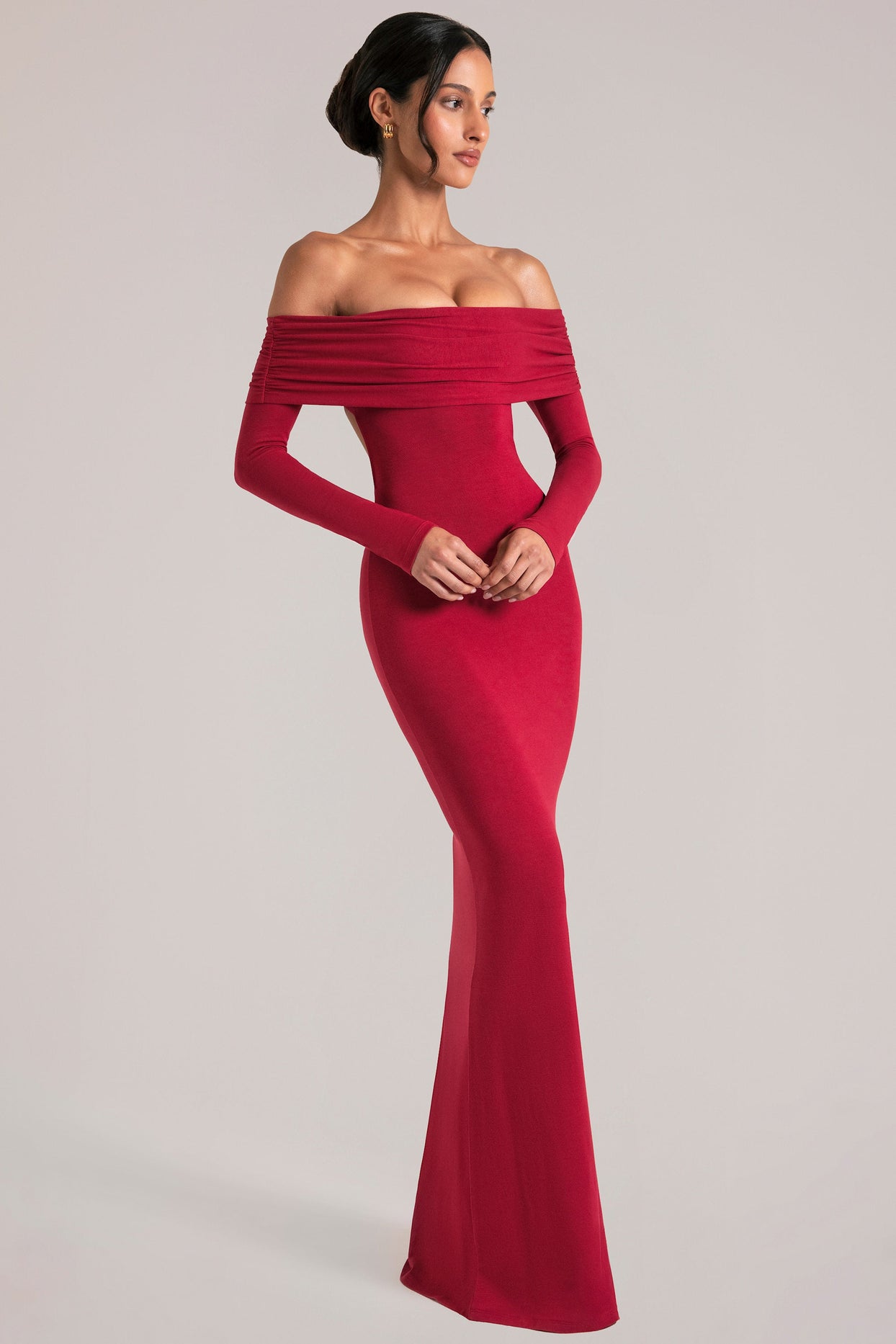 Oh Polly model Yasmin wearing the Depny Maxi Dress in Cherry Red Modal fabric perfect for summer weddings