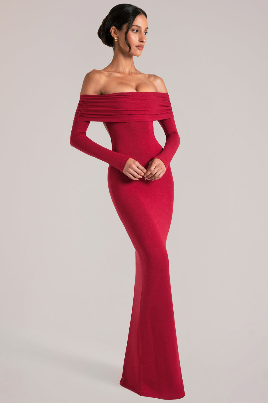 Oh Polly model Yasmin wearing the Depny Maxi Dress in Cherry Red Modal fabric perfect for summer weddings