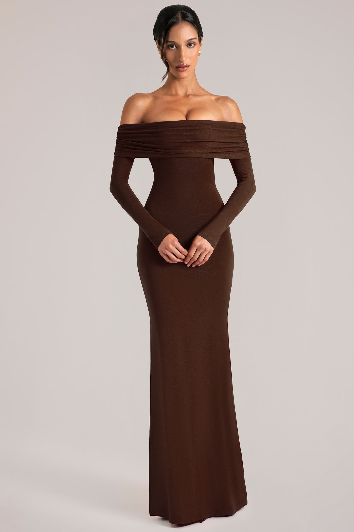 Oh Polly model Yasmin wearing the Depny Maxi Dress in Chocolate Brown Modal fabric perfect for summer weddings