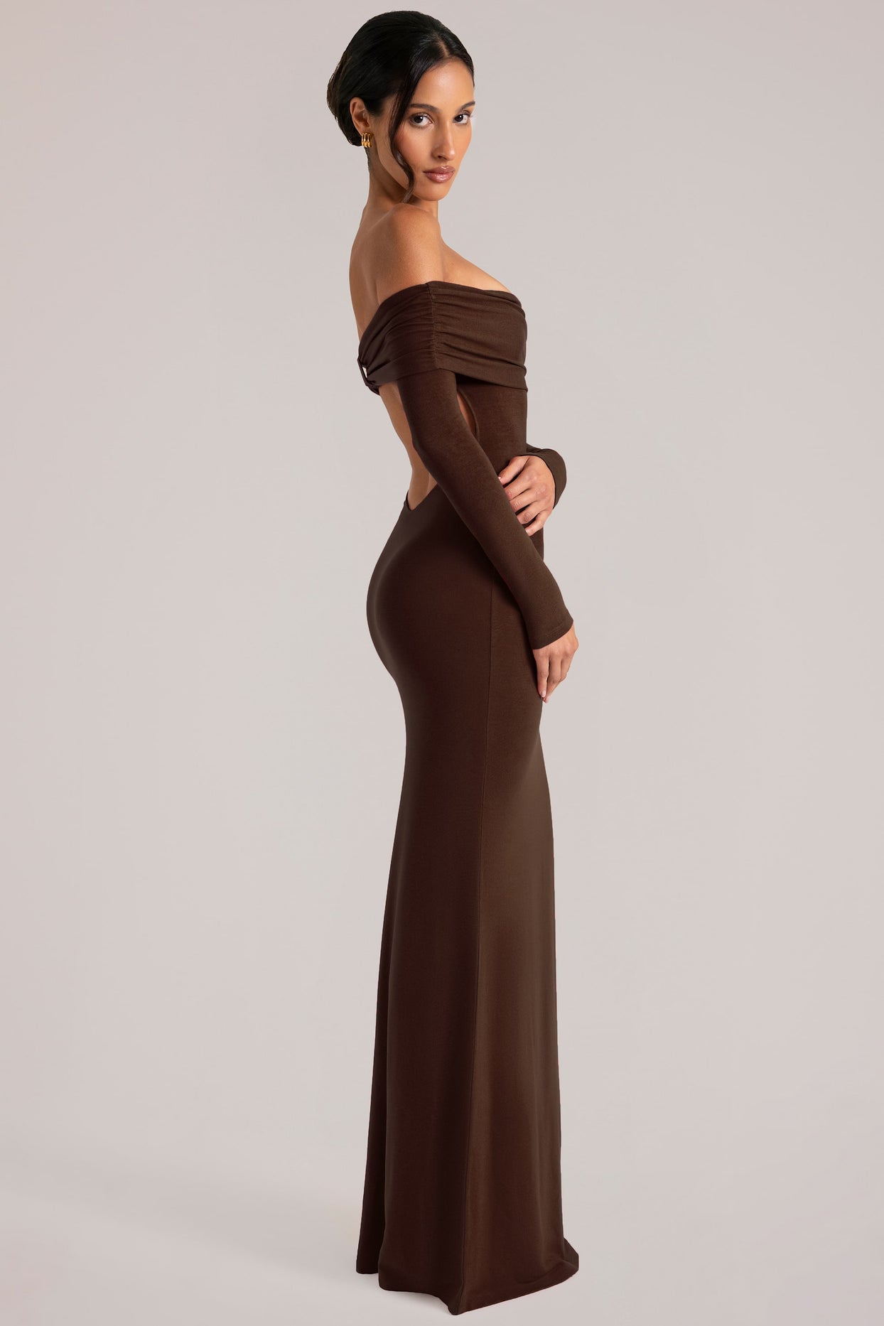 Oh Polly model Yasmin wearing the Depny Maxi Dress in Chocolate Brown Modal fabric perfect for evening parties