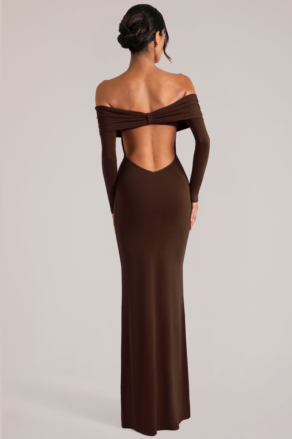 Oh Polly model Yasmin wearing the Depny Maxi Dress in Chocolate Brown Modal fabric perfect for summer weddings